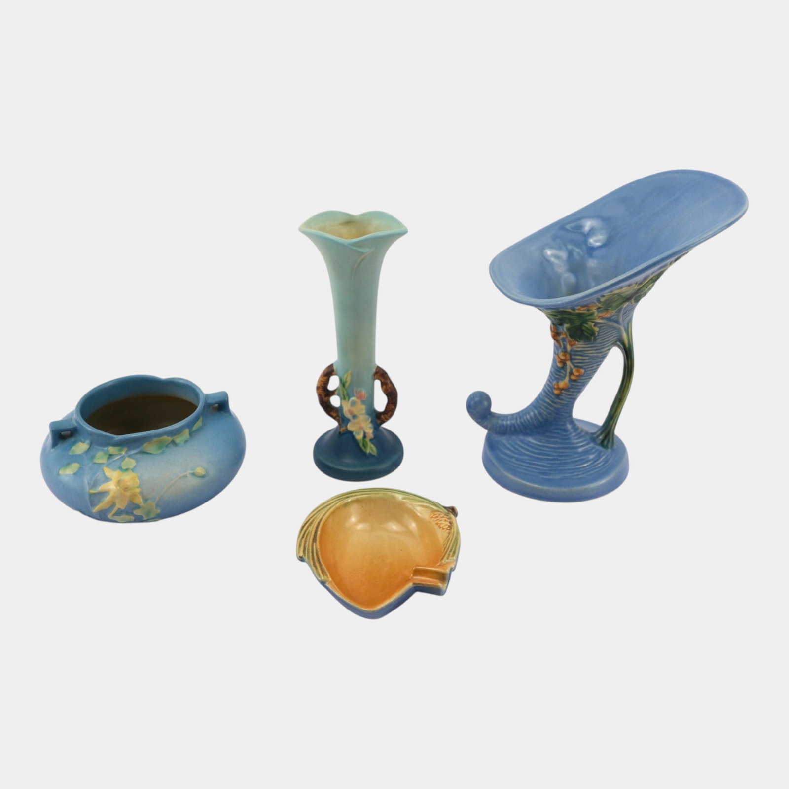 Roseville Bushberry, Columbine, Pinecone, & Apple Blossom Cornucopia Tray And Vases: Professional, fast, and affordable in house shipping available for all items. For higher resolution images please visit bid.craftedauctions.com Roseville Bushberry, Columbine, Pinecone, & Apple Bl