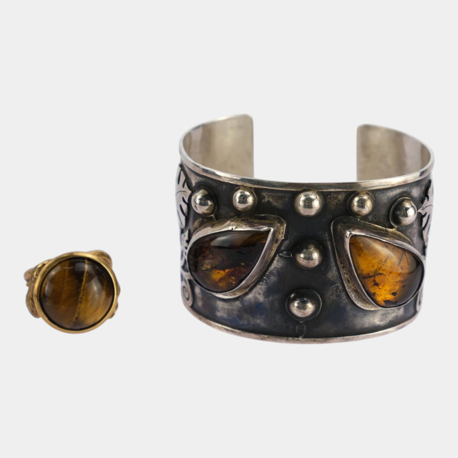 Mexican Amber Glass Modernist Wide Cuff Bracelet & Tiger Eye Statement Ring Set: Professional, fast, and affordable in house shipping available for all items. For higher resolution images please visit bid.craftedauctions.com Excellent condition. Age related wear. Cuff is 6 1/2" ci