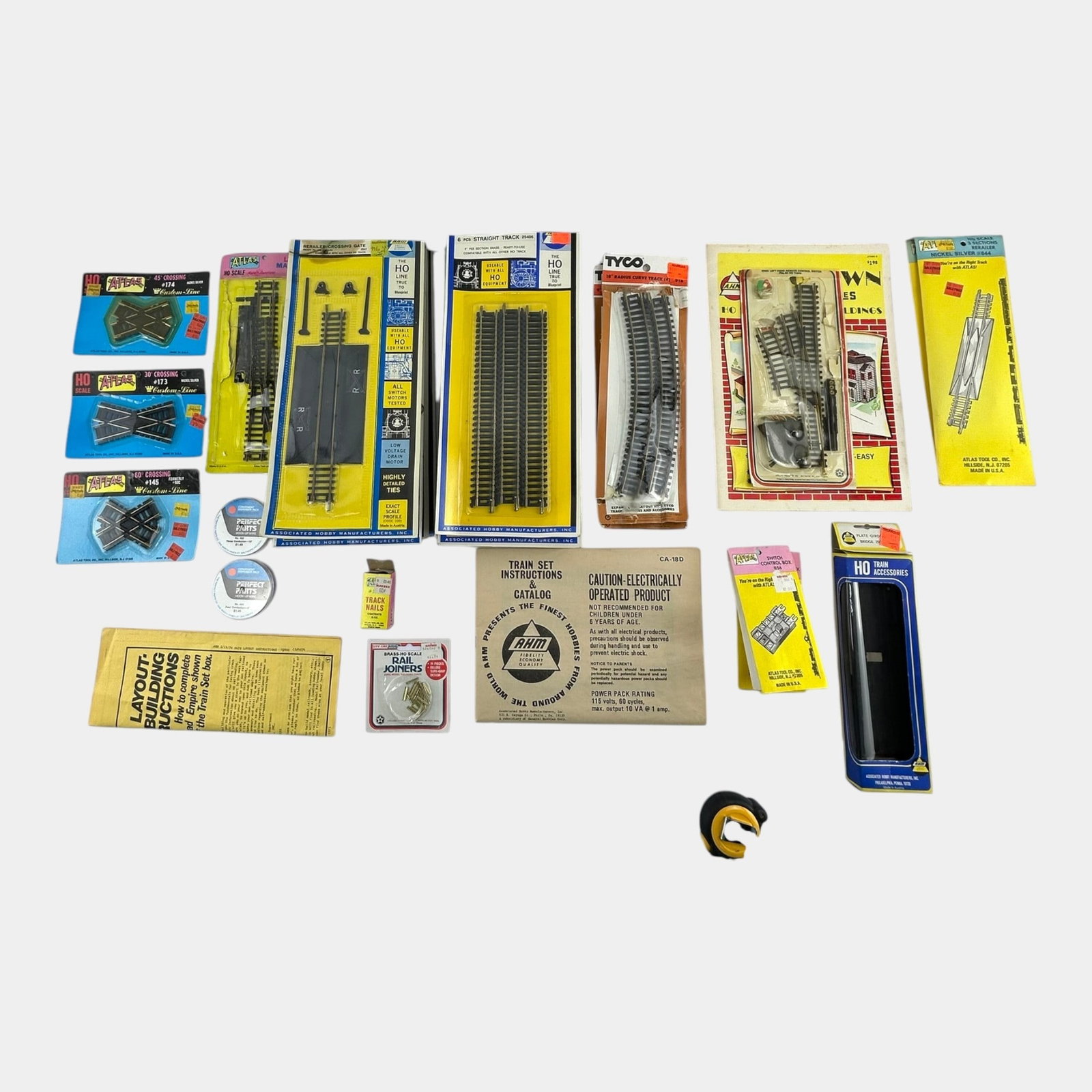 A.H.M Accessories, Tyco , & Other New In Package And Used Model Train Tracks And Accessories: Professional, fast, and affordable in house shipping available for all items. For higher resolution images please visit bid.craftedauctions.com A.H.M Accessories, Tyco , & Other New In Package And Use