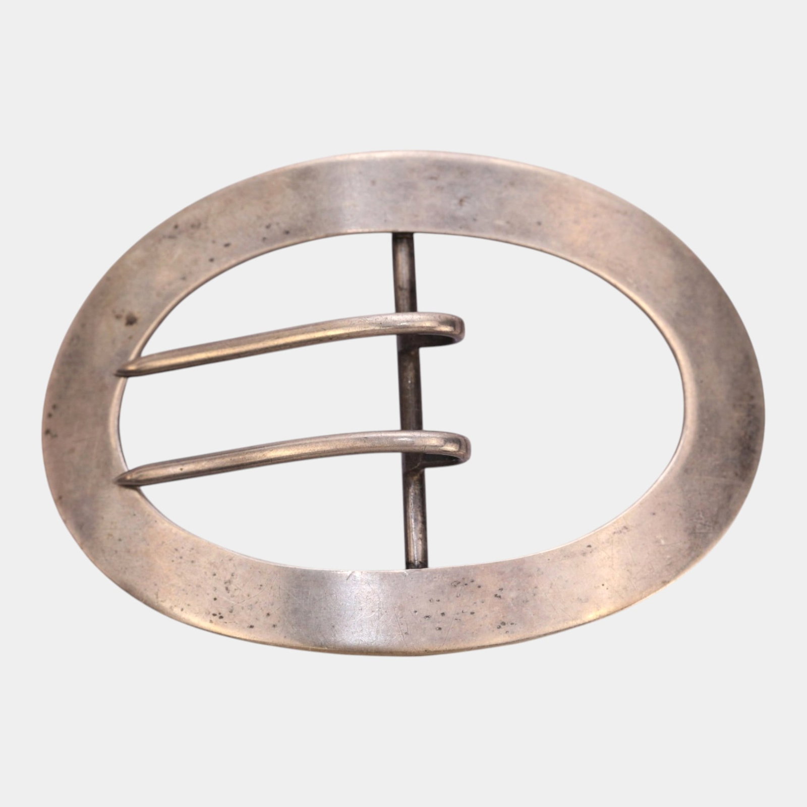 Sterling Silver Minimalist Mid Century Modernist Oval Belt Buckle With Openwork Design: Professional, fast, and affordable in house shipping available for all items. For higher resolution images please visit bid.craftedauctions.com Excellent condition. Age related wear. Marked as shown. 