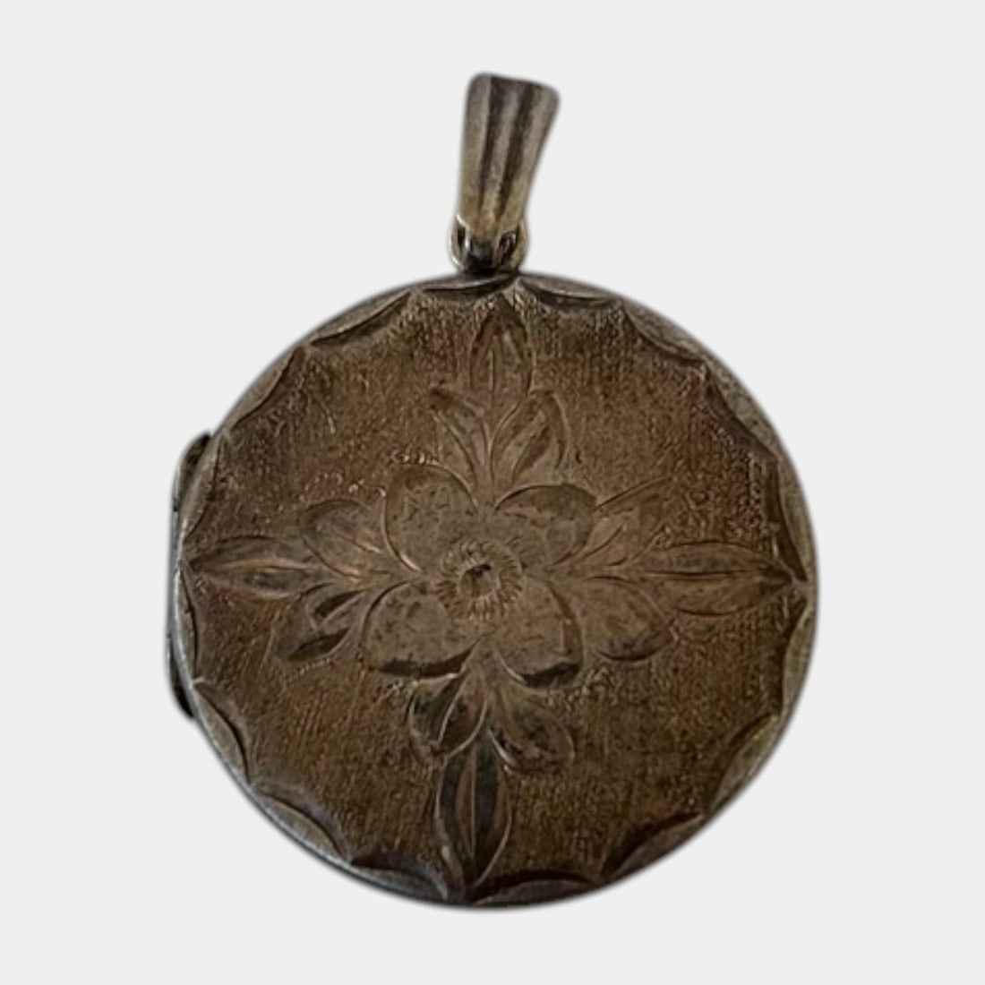 Early 20th Century Sterling Silver 925 Engraved Floral Round 2 Photo Frame Locket Pendant: Professional, fast, and affordable in house shipping available for all items. For higher resolution images please visit bid.craftedauctions.com Excellent condition. Age related wear. Marked Sterling S