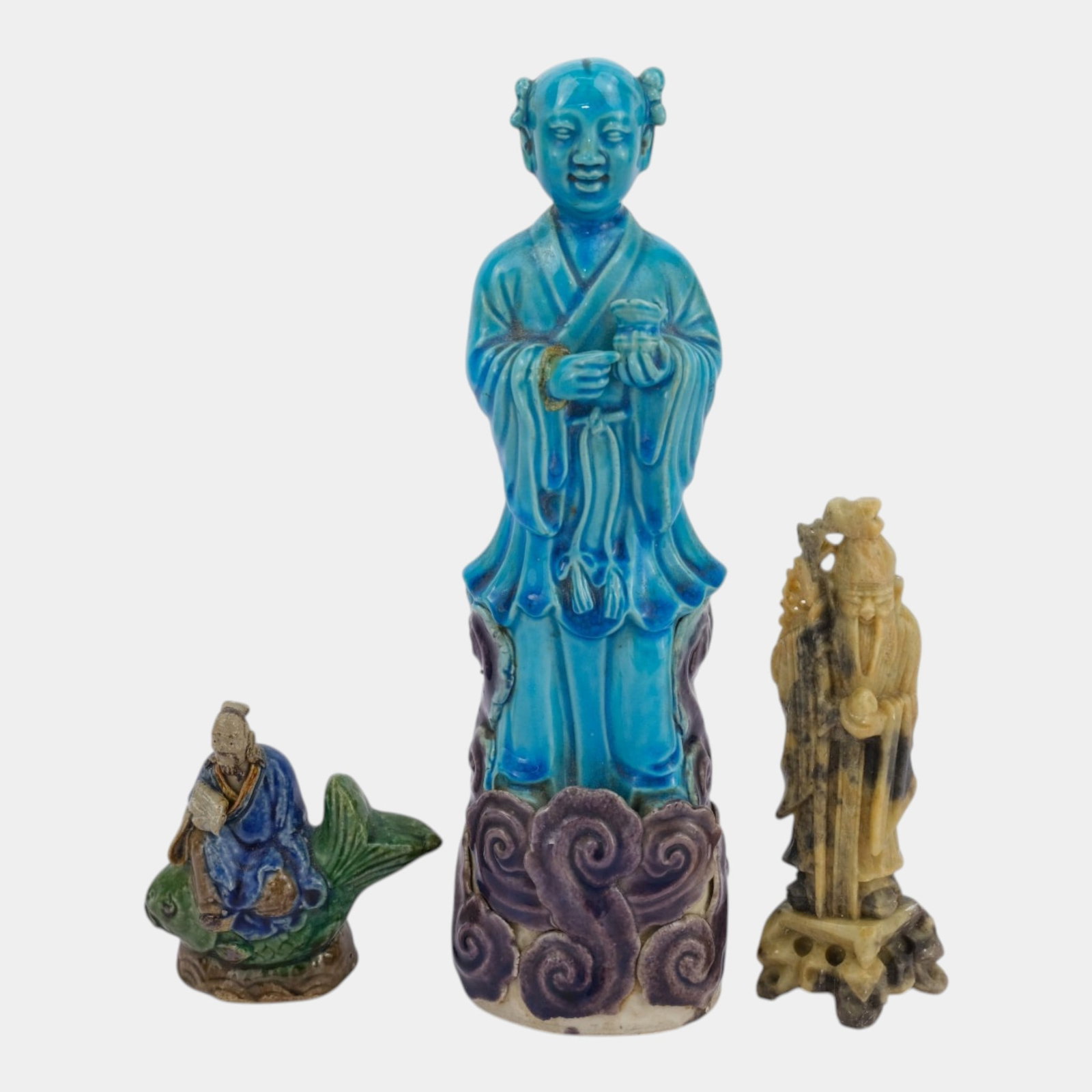 Asian Ceramic And Stone Figurine Collection Including Immortal Scholar And Guanyin Figures: Professional, fast, and affordable in house shipping available for all items. For higher resolution images please visit bid.craftedauctions.com Asian Ceramic And Stone Figurine Collection Including Im