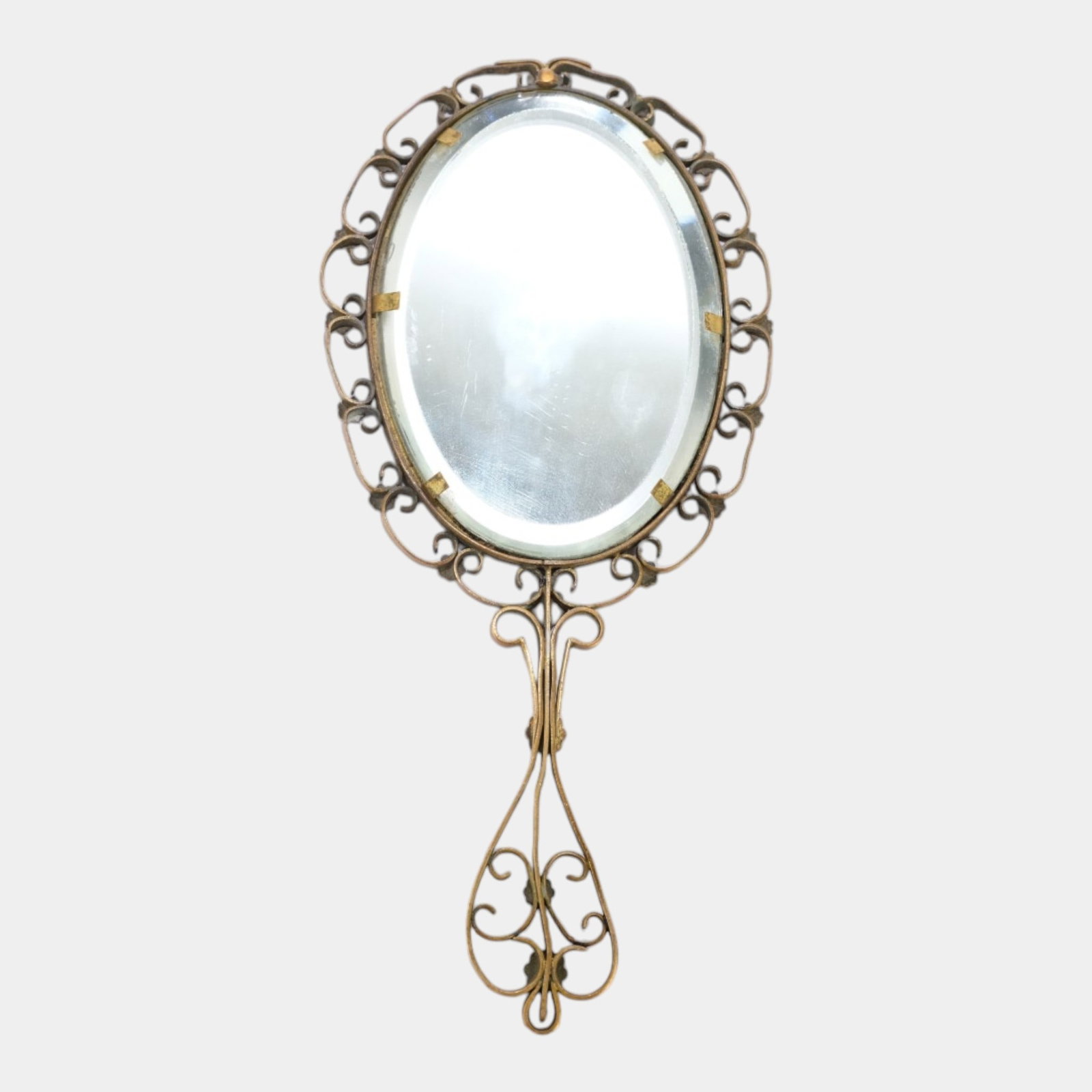 Vintage Gold Tone Filigree Hand Mirror With Floral Needlepoint Reverse Decoration: Professional, fast, and affordable in house shipping available for all items. For higher resolution images please visit bid.craftedauctions.com Vintage Gold Tone Filigree Hand Mirror With Floral Needl