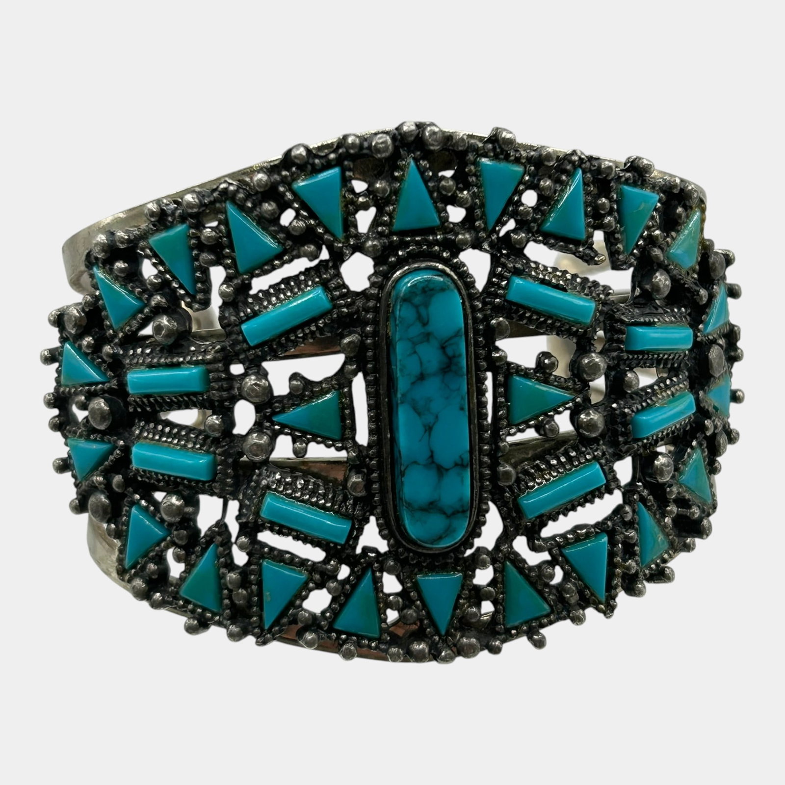 Southwestern Style Turquoise Color Stone Wide Cuff Bracelet With Geometric Design: Professional, fast, and affordable in house shipping available for all items. For higher resolution images please visit bid.craftedauctions.com Excellent condition. Age related wear. Size 6.5