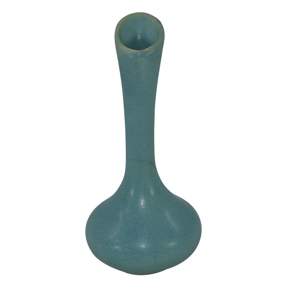 Van Briggle Vintage Pottery 1960s Blue Bud Vase: Professional, fast, and affordable in house shipping available for all items. For higher resolution images please visit bid.craftedauctions.com Van Briggle Pottery blue bud vase. Has been cleanly reat