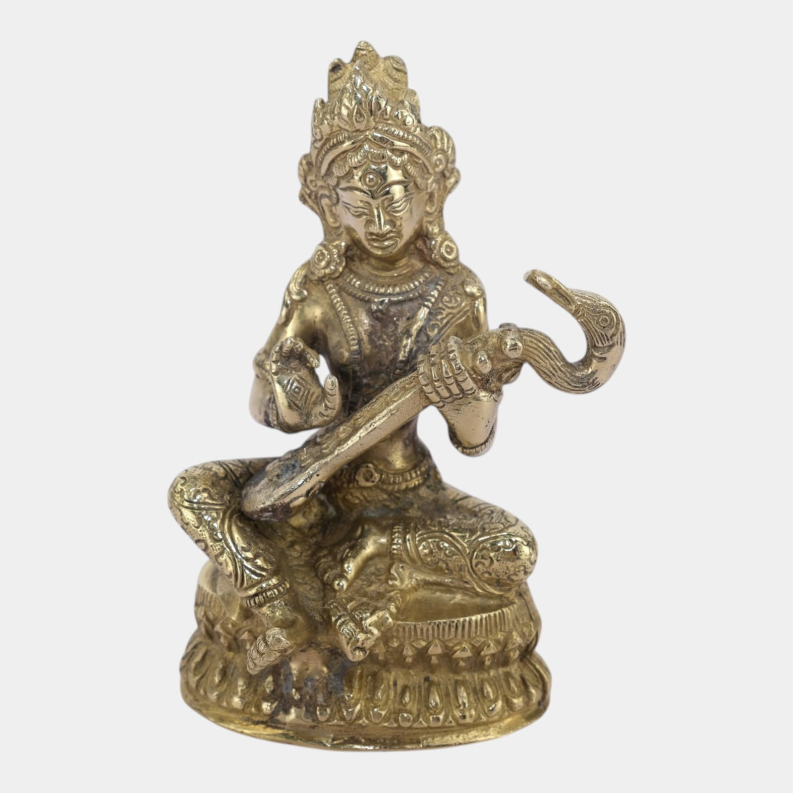 Brass Saraswati Hindu Goddess Playing Veena Sculpture Indian Figure Statue: Professional, fast, and affordable in house shipping available for all items. For higher resolution images please visit bid.craftedauctions.com Brass Saraswati Hindu Goddess Playing Veena Sculpture In