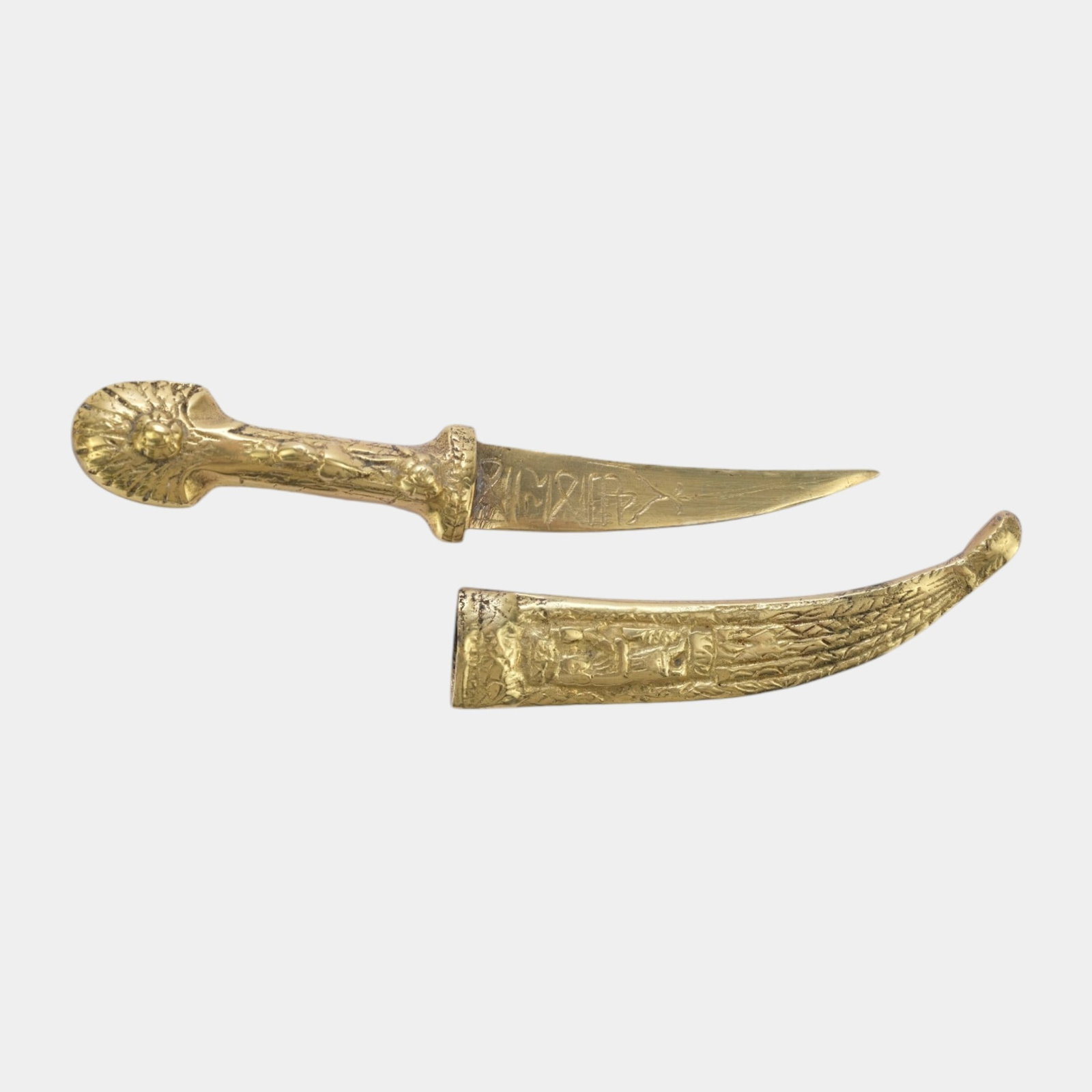 Egyptian Revival Brass Dagger And Scabbard With Hieroglyphic Decoration Display Piece: Professional, fast, and affordable in house shipping available for all items. For higher resolution images please visit bid.craftedauctions.com Egyptian Revival Brass Dagger And Scabbard With Hierogly