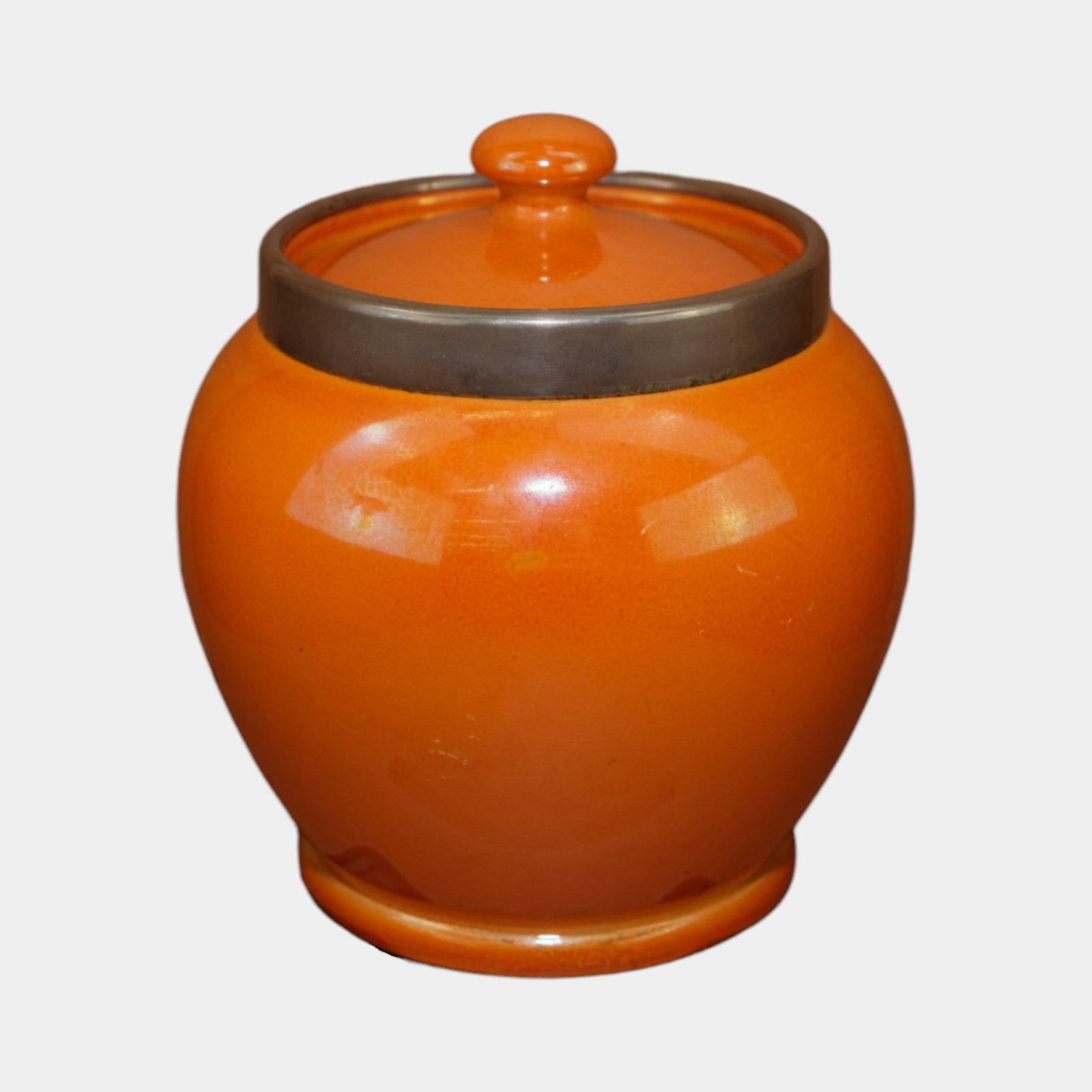 Moorcroft Early 20th Century English Art Deco Pottery Burslem Orange Iridescent Lidded Jar: Professional, fast, and affordable in house shipping available for all items. For higher resolution images please visit bid.craftedauctions.com Moorcroft Early 20th Century English Art Deco Pottery Bu