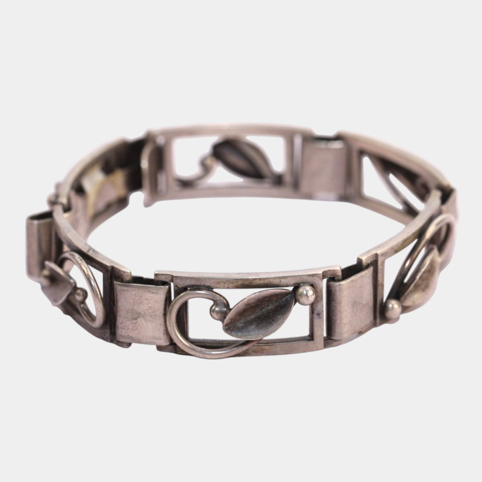 Eiler & Marloe E&M Danish 830 Silver 1940s Decorated Panel Mid Century Modern Link Bracelet: Professional, fast, and affordable in house shipping available for all items. For higher resolution images please visit bid.craftedauctions.com Elegantly minimalist and distinctly Scandinavian, this E