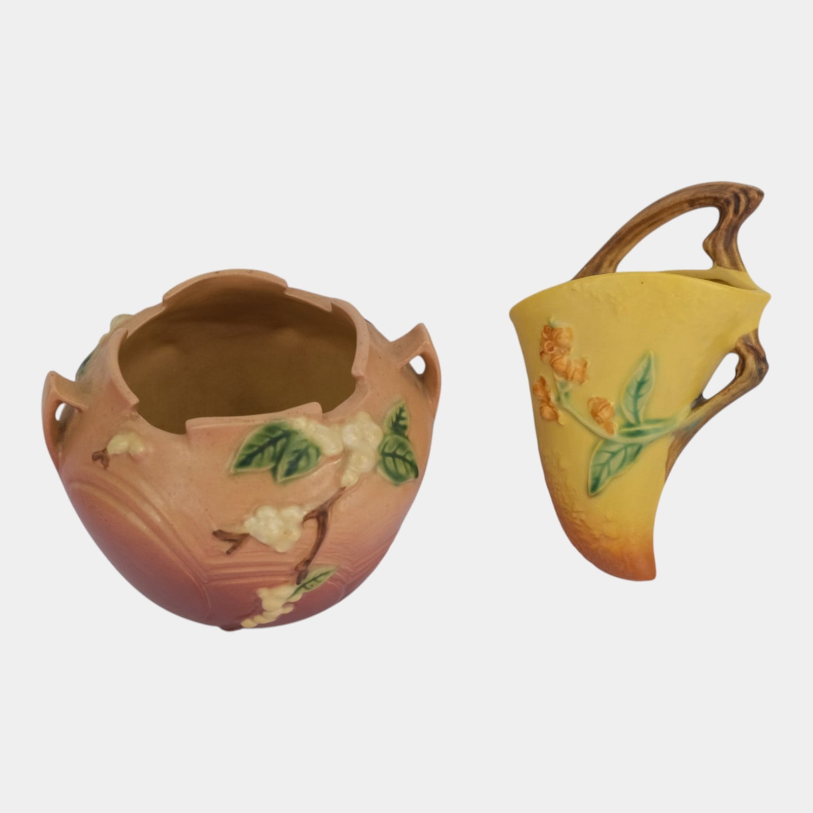 Roseville Mid Century Modern Art Pottery Pink Snowberry Vase & Bittersweet Yellow Wall Pocket: Professional, fast, and affordable in house shipping available for all items. For higher resolution images please visit bid.craftedauctions.com Roseville Mid Century Modern Art Pottery Pink Snowberry 