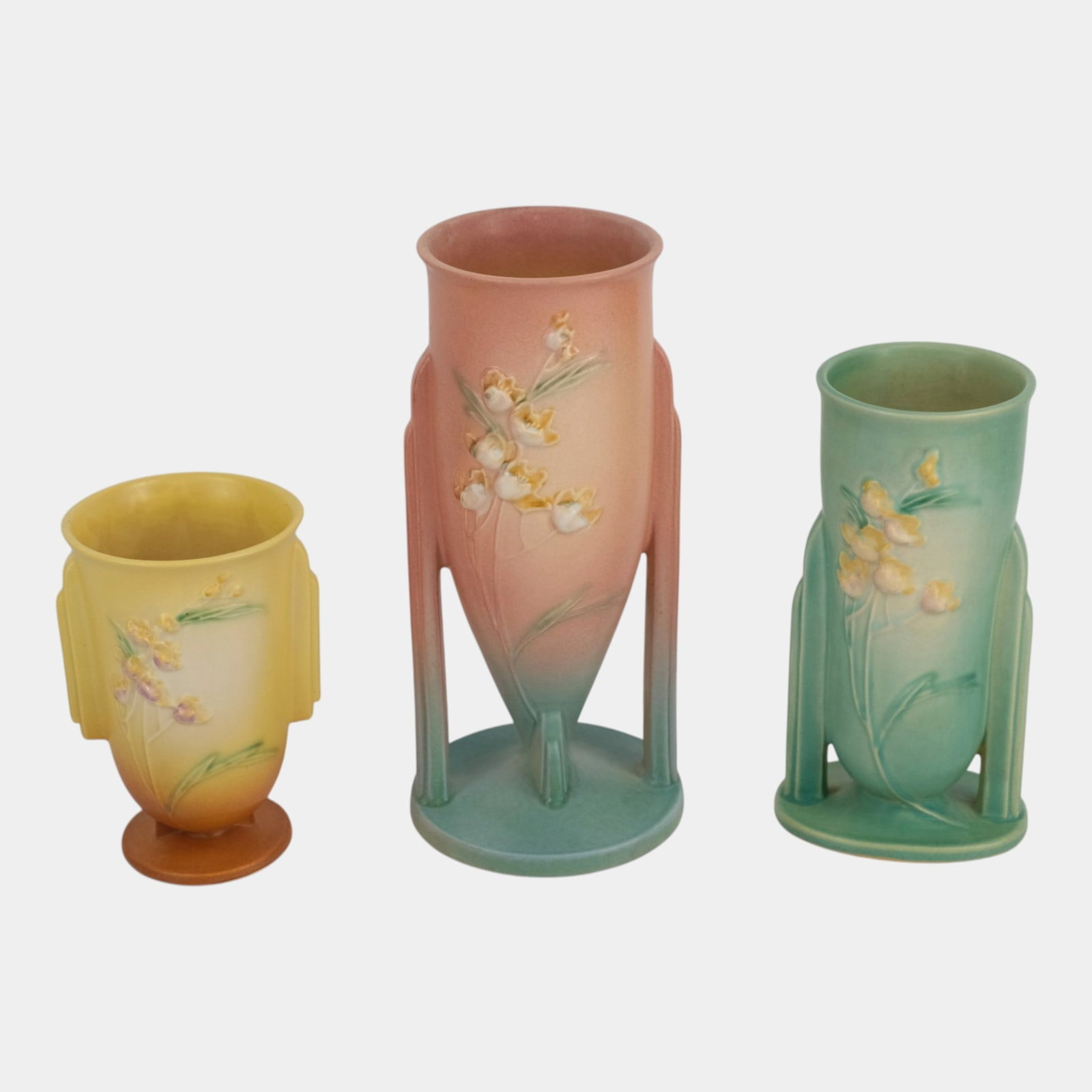 Roseville Art Pottery Ixia Pink Yellow Green 1937 Vintage Art Deco Footed Floral Decorated Vases: Professional, fast, and affordable in house shipping available for all items. For higher resolution images please visit bid.craftedauctions.com Roseville Art Pottery Ixia Pink Yellow Green 1937 Vintag