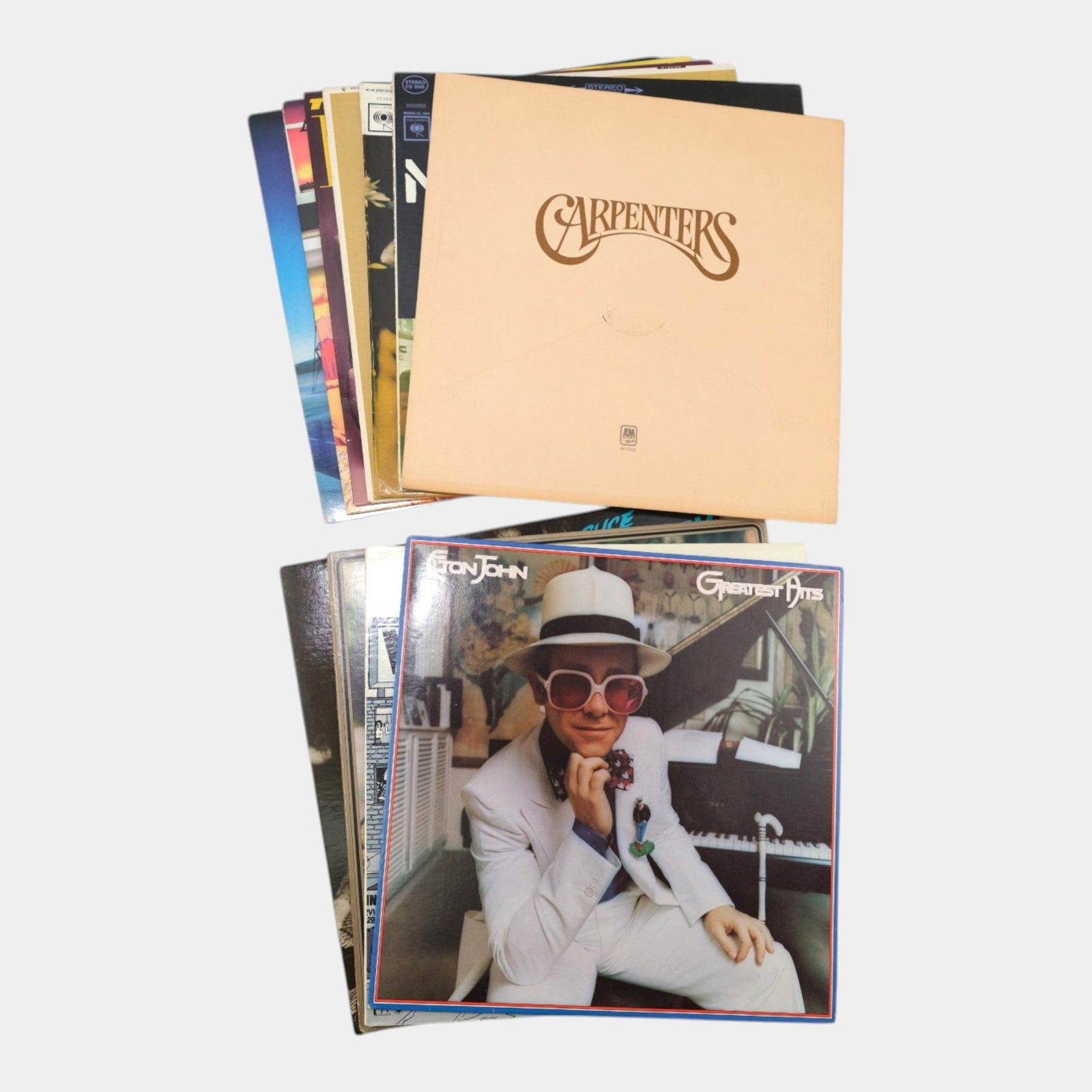 Carpenters, Elton John, Journey, Simon And Garfunkel & Other Vintage Rock & Pop Vinyl Records: Professional, fast, and affordable in house shipping available for all items. For higher resolution images please visit bid.craftedauctions.com Carpenters, Elton John, Journey, Simon And Garfunkel & O