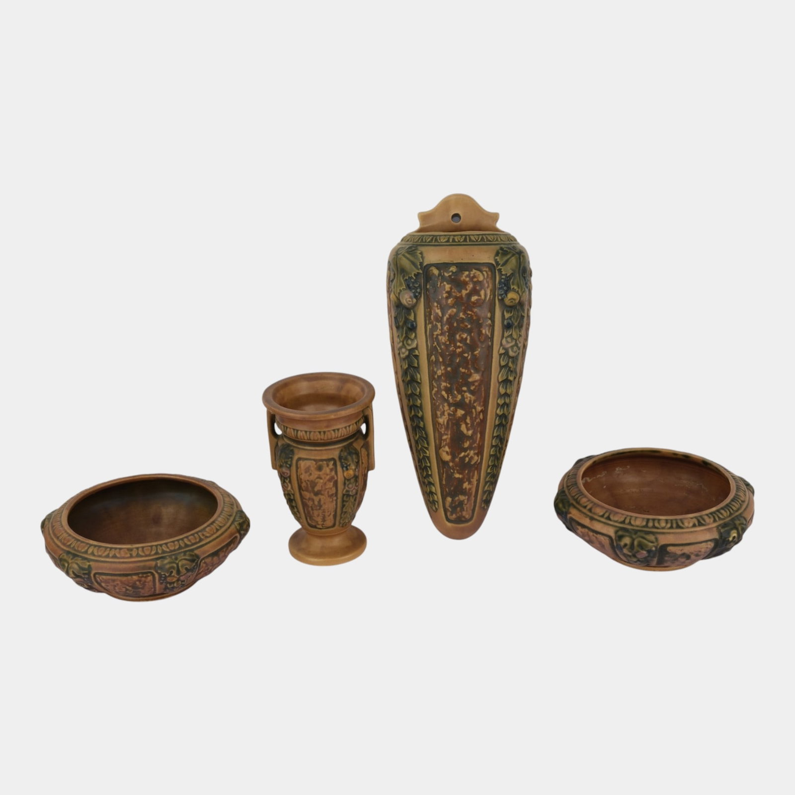 Roseville Florentine Brown Arts And Crafts Pottery Bowls, Wall Pocket, & Vase: Professional, fast, and affordable in house shipping available for all items. For higher resolution images please visit bid.craftedauctions.com Roseville Florentine Brown Arts And Crafts Pottery Bowls