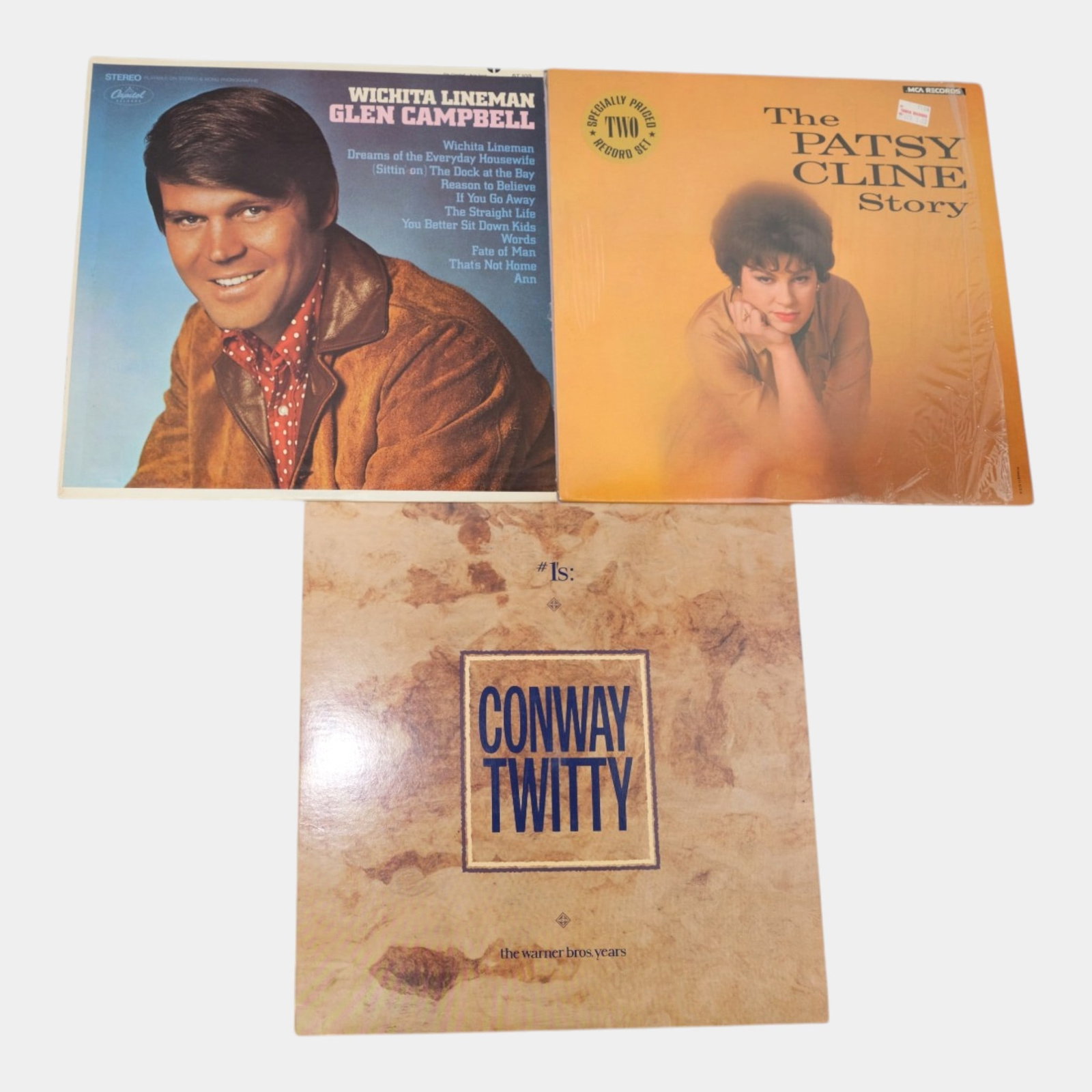 Conway Twitty, Patsy Cline, & Glen Campbell Original Vintage Country Vinyl Records: Professional, fast, and affordable in house shipping available for all items. For higher resolution images please visit bid.craftedauctions.com Conway Twitty, Patsy Cline, & Glen Campbell Original Vin