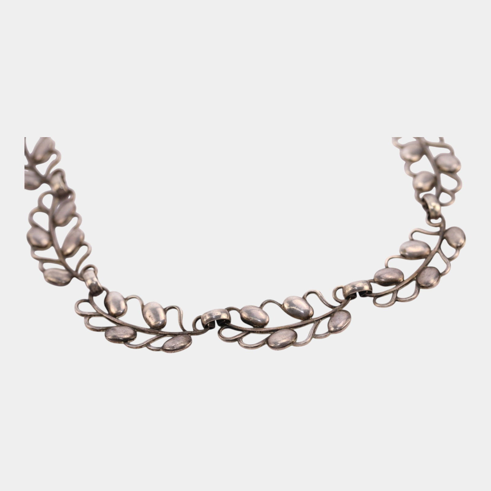 Sterling Silver Double Strand Leaf And Berry Link Necklace Mid Century Modern Jewelry: Professional, fast, and affordable in house shipping available for all items. For higher resolution images please visit bid.craftedauctions.com Excellent condition. Age related wear. Tested and guaran