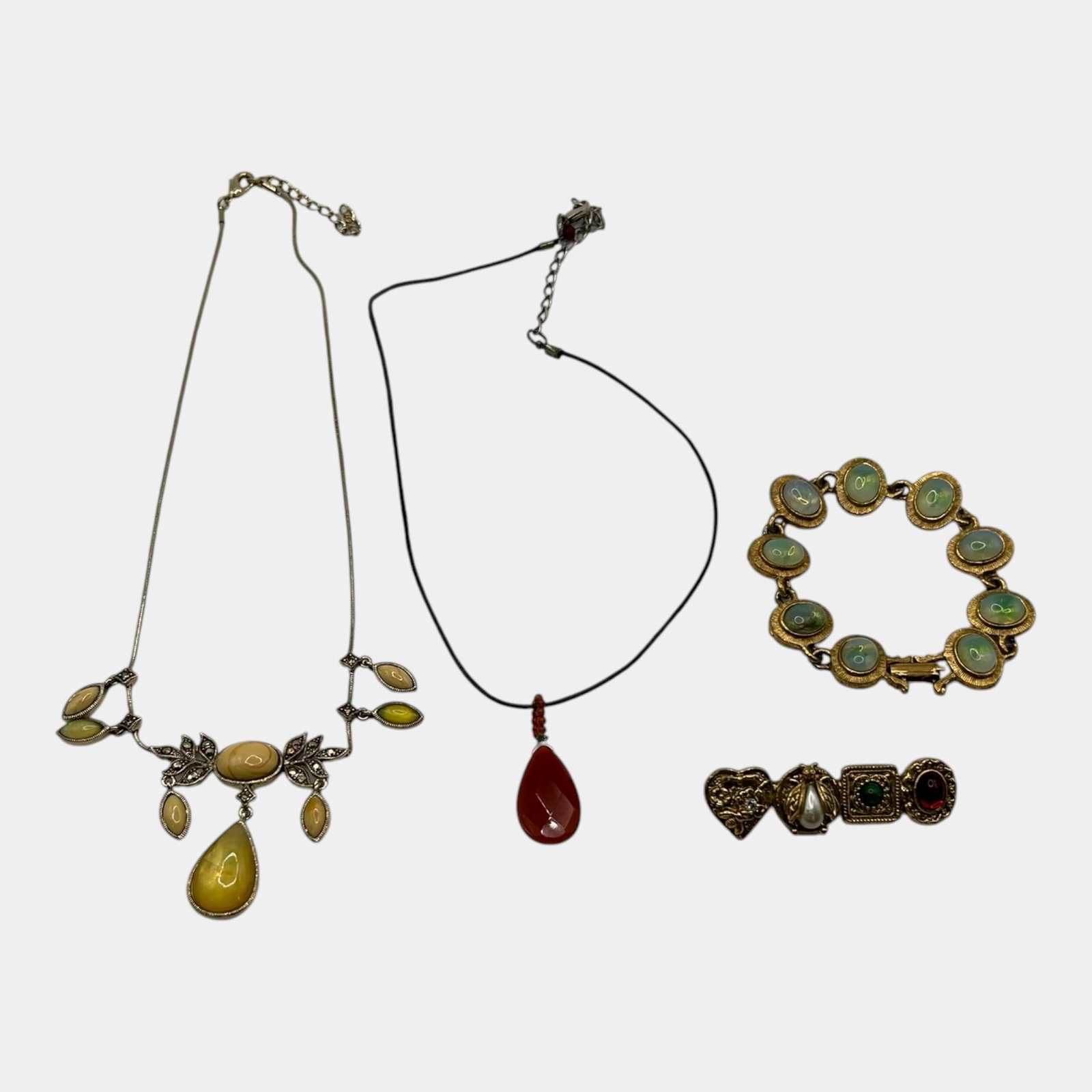Costume Jewelry Collection Including Necklaces Bracelet And Figural Bee Brooch: Professional, fast, and affordable in house shipping available for all items. For higher resolution images please visit bid.craftedauctions.com Excellent condition. Age related wear. Bracelet is size 