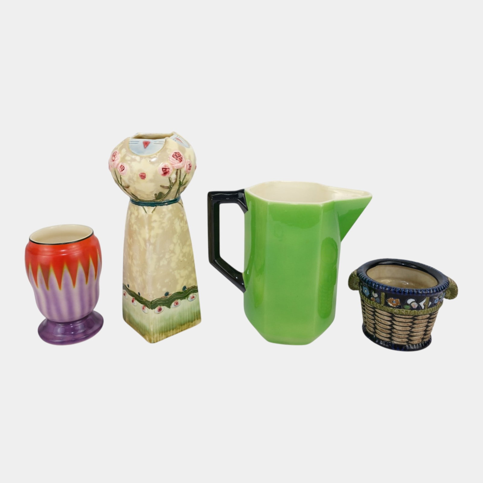 European Early 20th Century Colorful Art Deco Pottery Green Black Handled Pitcher & Vases: Professional, fast, and affordable in house shipping available for all items. For higher resolution images please visit bid.craftedauctions.com European Early 20th Century Colorful Art Deco Pottery Gr