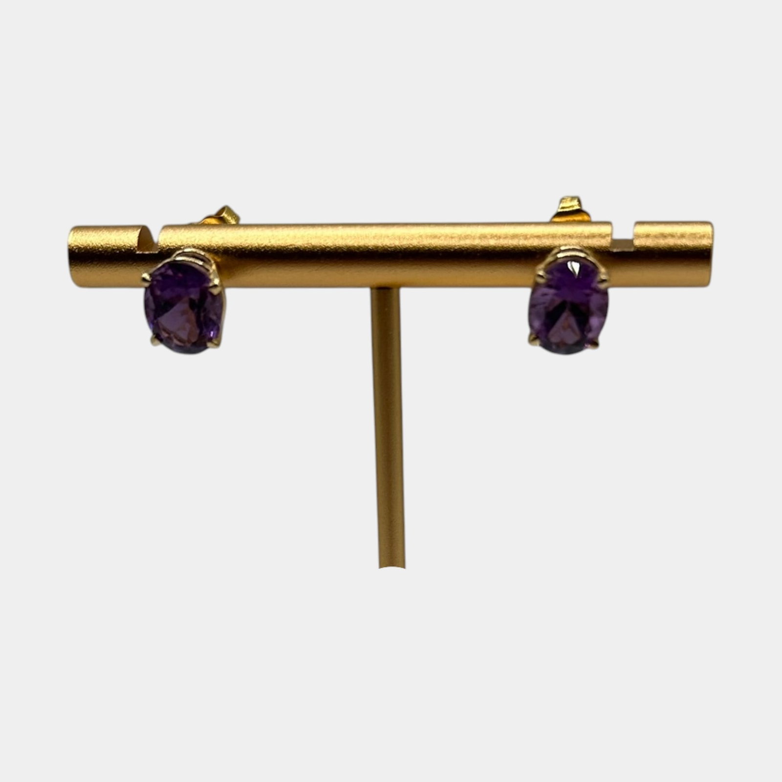 14K Yellow Gold And Prong Set Oval Cut Amethyst Gemstone Stud Earrings: Professional, fast, and affordable in house shipping available for all items. For higher resolution images please visit bid.craftedauctions.com Elegant 14K gold stud earrings featuring richly colored 