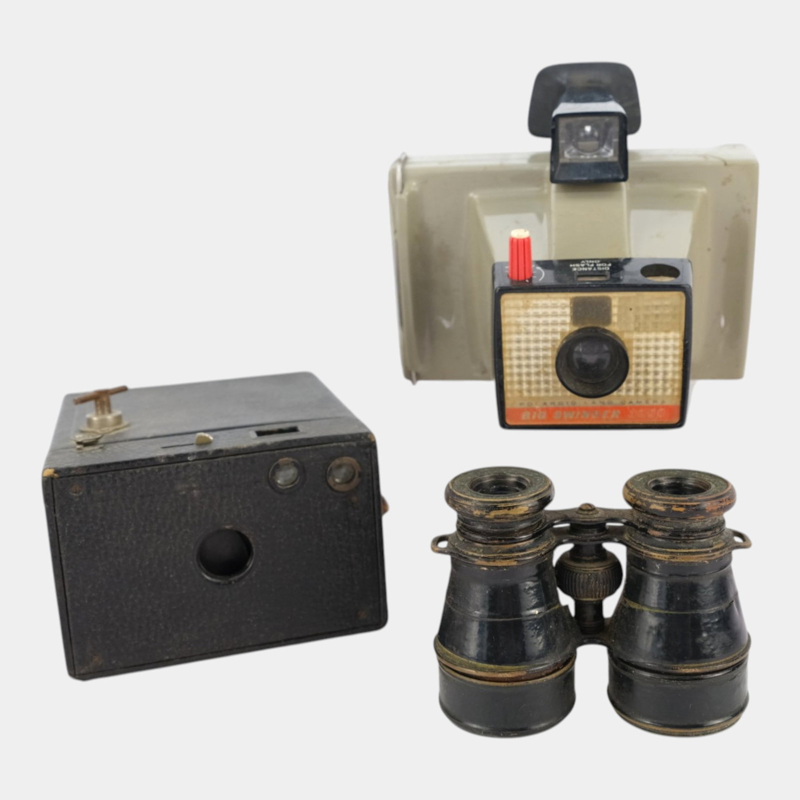 Antique Binoculars, Kodak Brownie Camera, And Vintage Camera Flash Photography Grouping: Professional, fast, and affordable in house shipping available for all items. For higher resolution images please visit bid.craftedauctions.com Antique Binoculars, Kodak Brownie Camera, And Vintage Ca