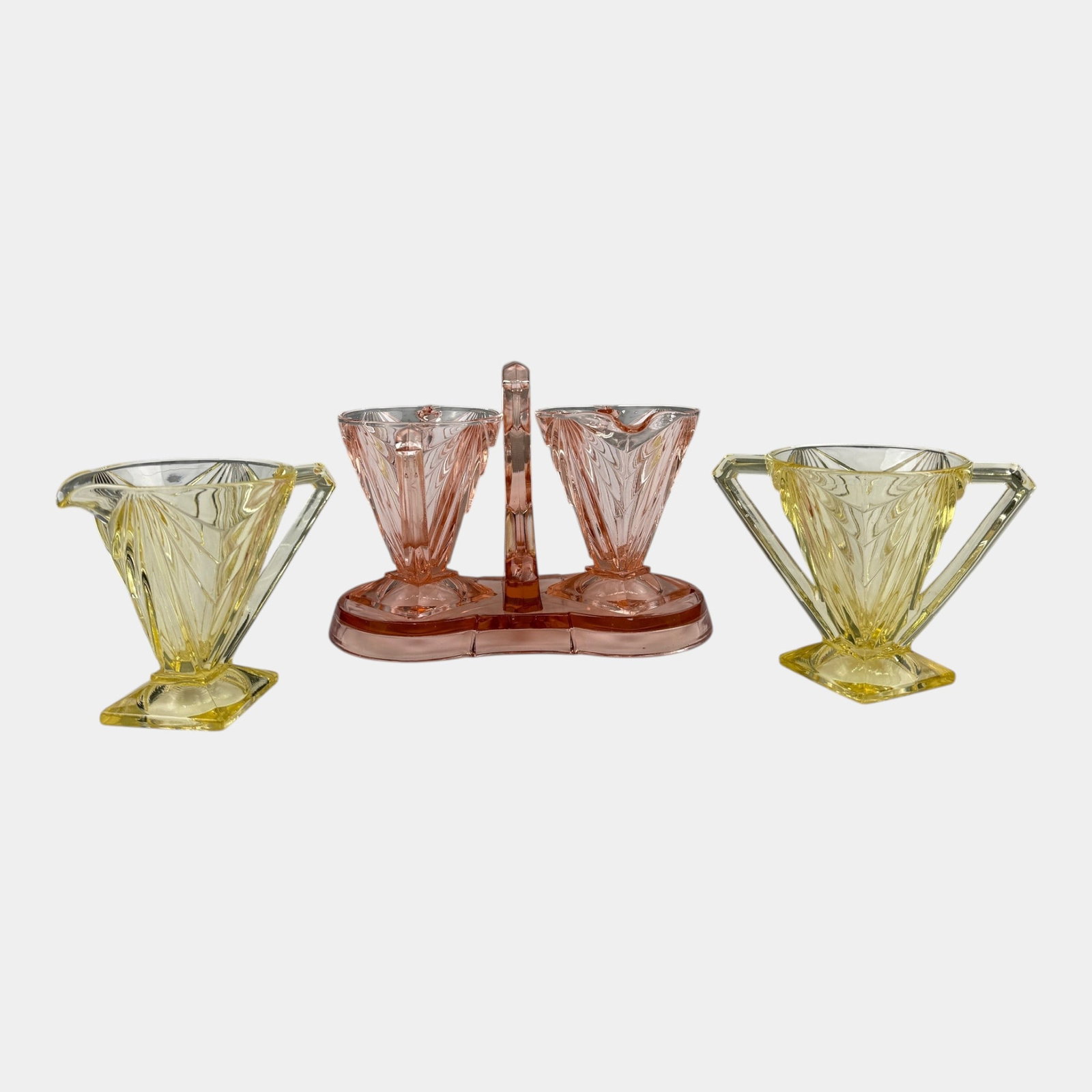 Indiana Glass 1930s Art Deco Pink & Yellow "Pyramid" Pattern Creamer & Sugar With Pink Caddy: Professional, fast, and affordable in house shipping available for all items. For higher resolution images please visit bid.craftedauctions.com Indiana Glass 1930s Art Deco Pink & Yellow "Pyramid" Pat