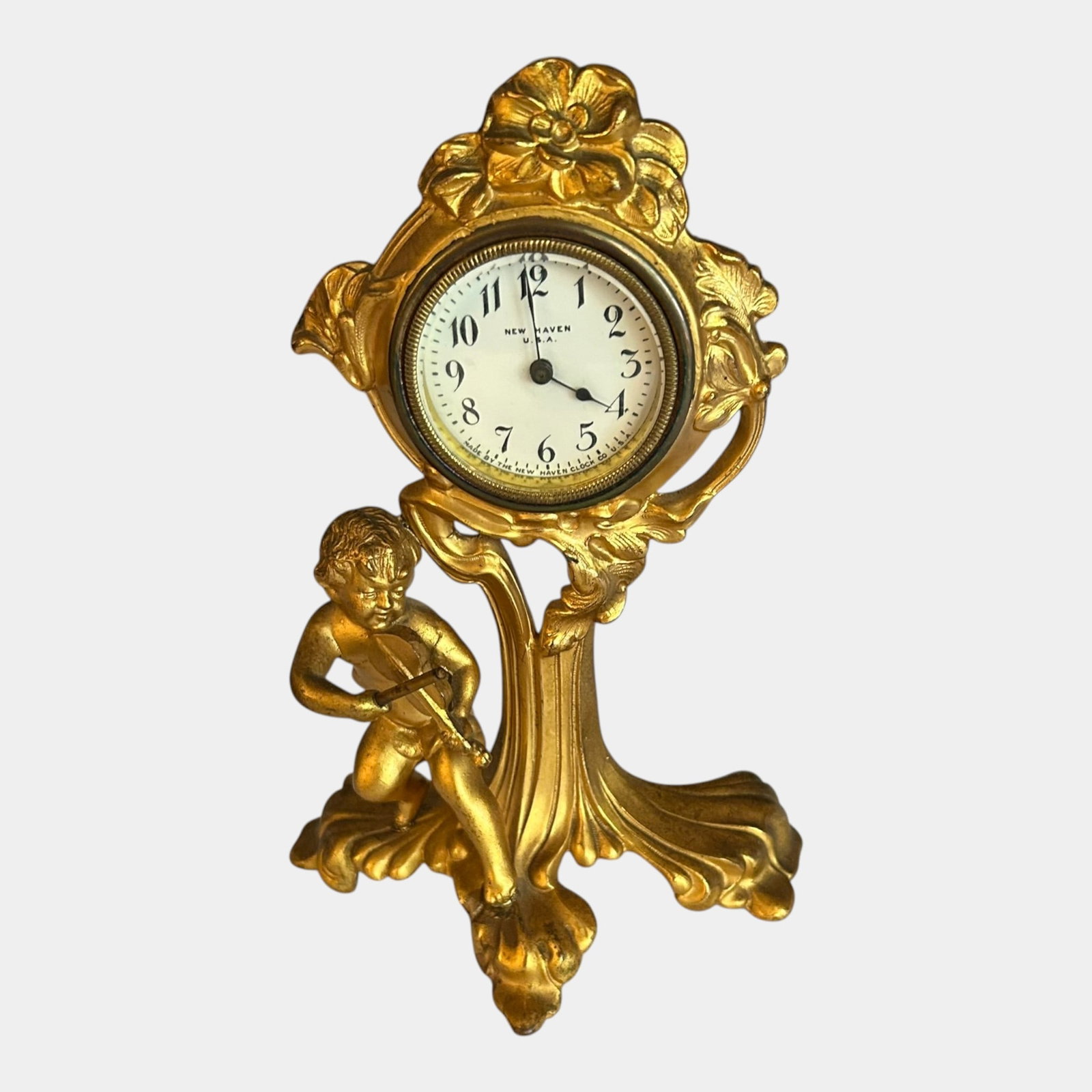 New Haven Clock Co. 19th Century Gilded Metal Art Nouveau Cherub Tree Clock: Professional, fast, and affordable in house shipping available for all items. For higher resolution images please visit bid.craftedauctions.com New Haven Clock Co. 19th Century Gilded Metal Art Nouvea