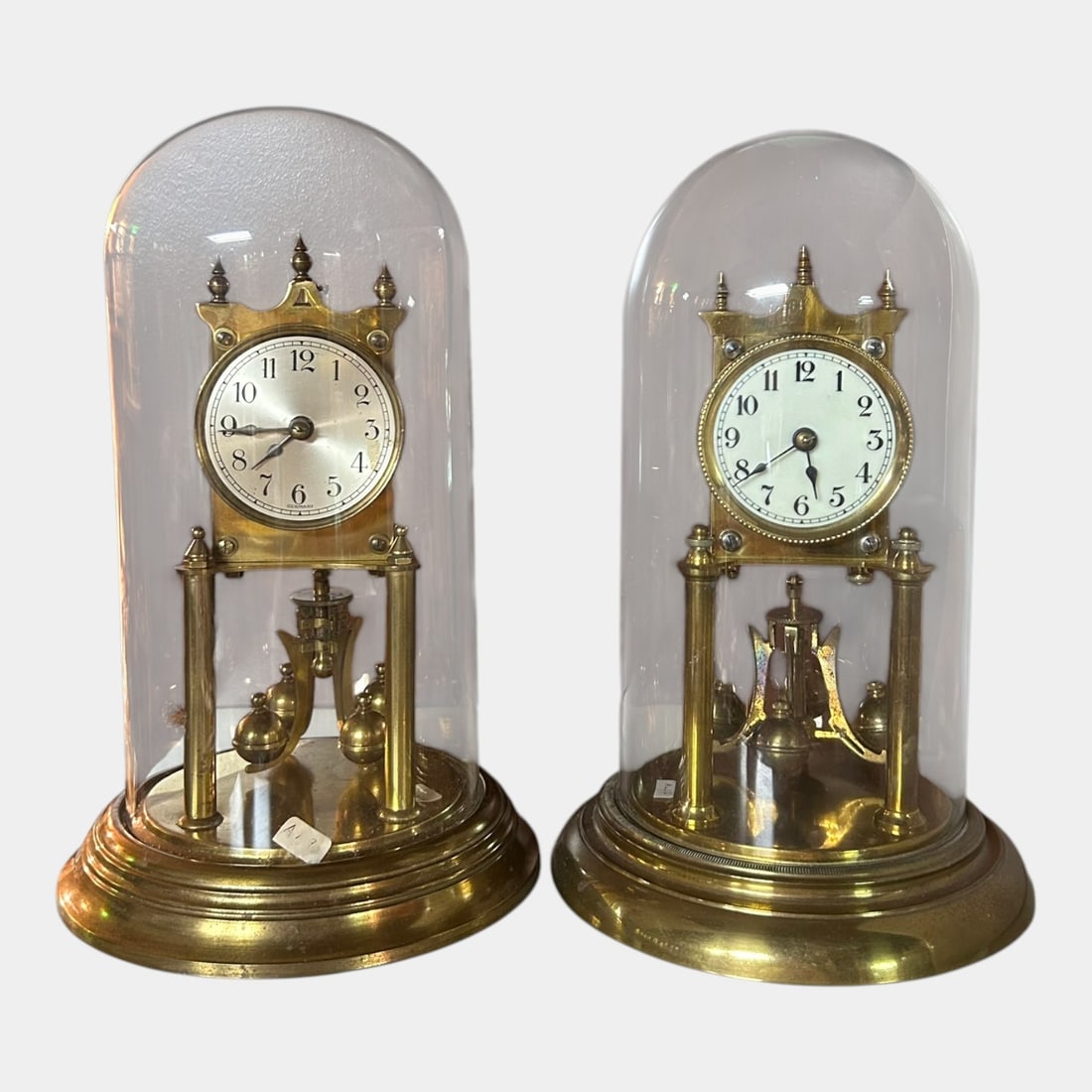 German Mid Century Brass Glass Dome Torsion Pendulum Anniversary Mantel Clocks: Professional, fast, and affordable in house shipping available for all items. For higher resolution images please visit bid.craftedauctions.com German Mid Century Brass Glass Dome Torsion Pendulum Ann