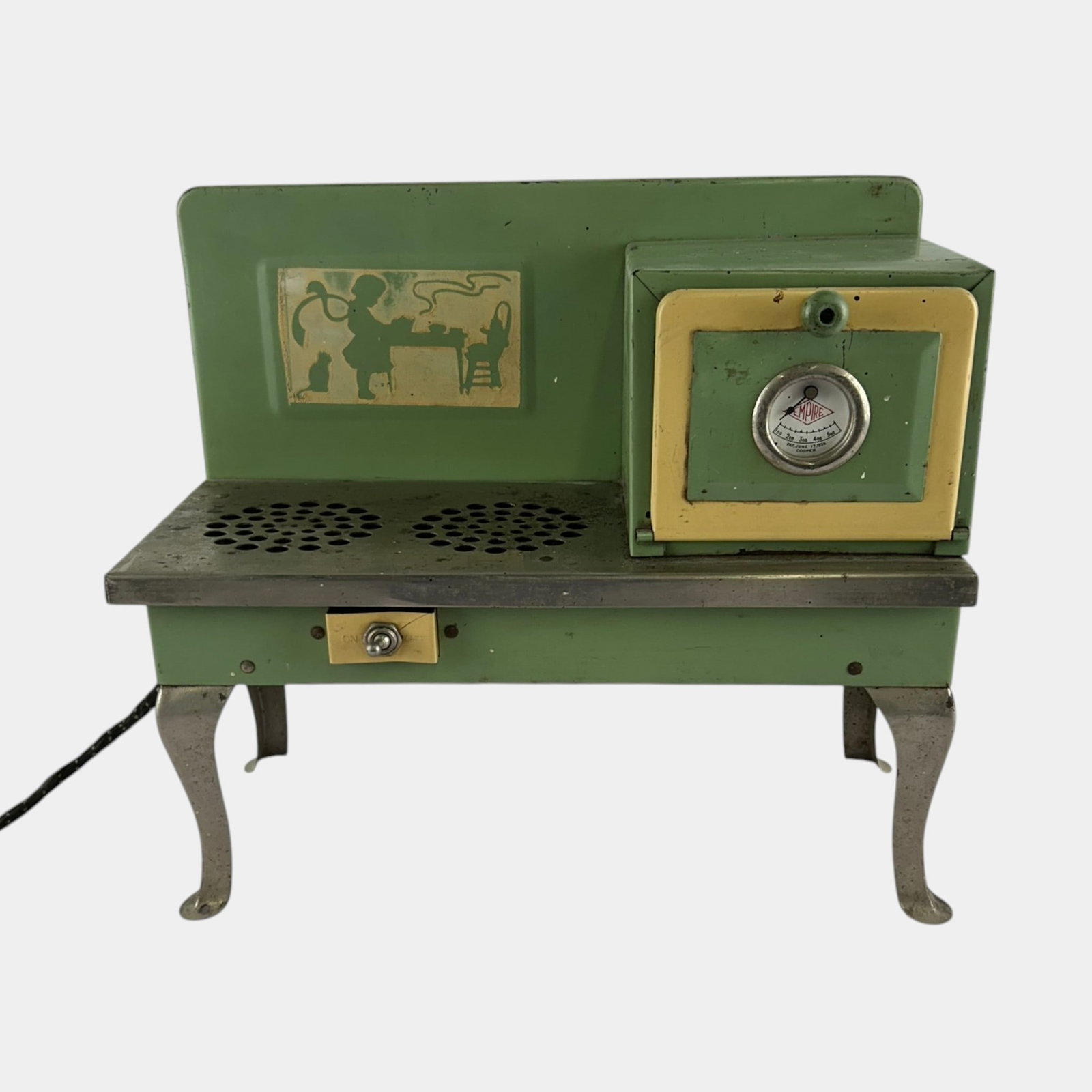 Empire Metal Ware 1930s Green Painted Metal Childs Electric Toy Stove: Professional, fast, and affordable in house shipping available for all items. For higher resolution images please visit bid.craftedauctions.com Empire Metal Ware 1930s Green Painted Metal Childs Elect