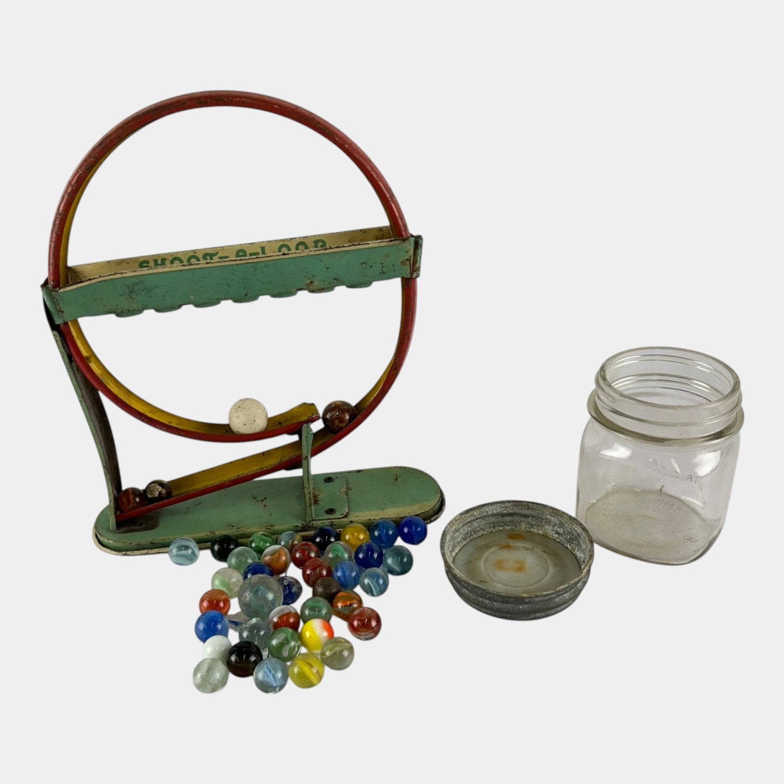 Wolverine Supply MFG Co. Tin Lith Marble Toy WIth Jar Of Various Style Glass Marbles (1 of 8)