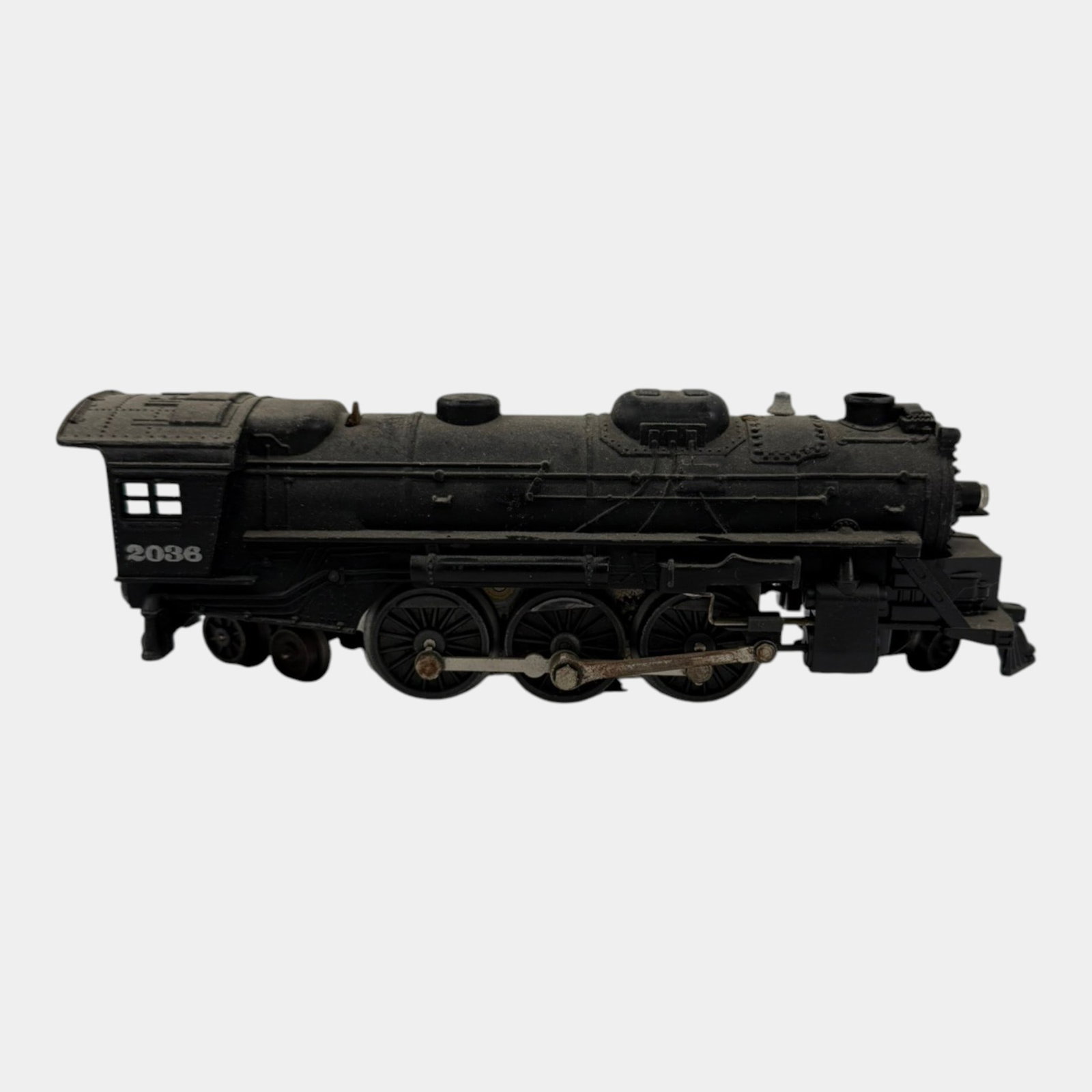 Lionel Trains Post War Black Steam Locomotive Engine 2036: Professional, fast, and affordable in house shipping available for all items. For higher resolution images please visit bid.craftedauctions.com Lionel Trains Post War Black Steam Locomotive Engine 203