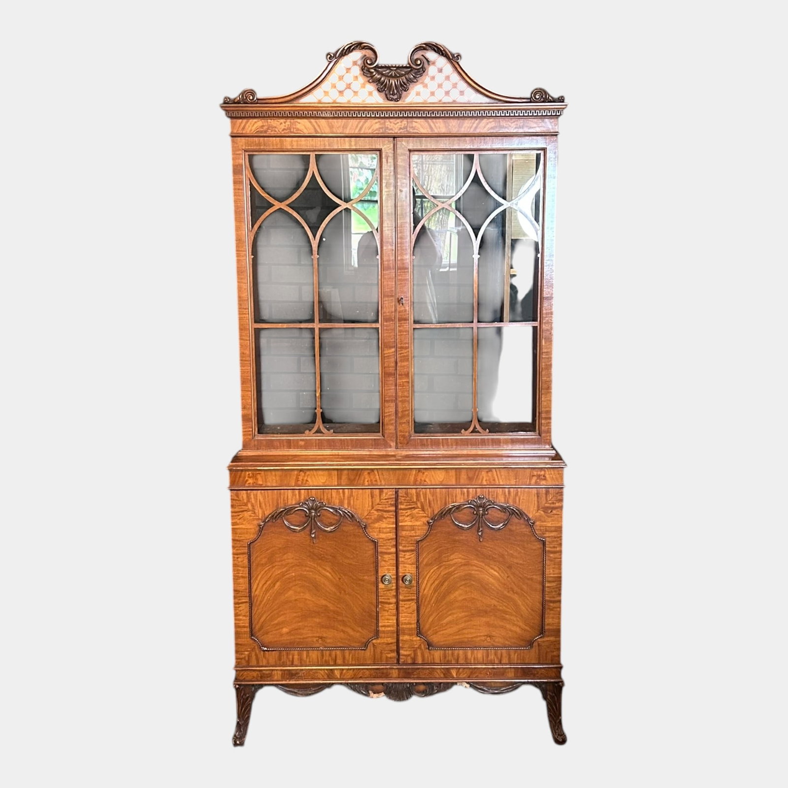 Antique Hardwood China Cabinet Burl Veneer Gothic Glass Doors Carved Ribbon Crest Display: Professional, fast, and affordable in house shipping available for all items. For higher resolution images please visit bid.craftedauctions.com Antique Hardwood China Cabinet Burl Veneer Gothic Glass 