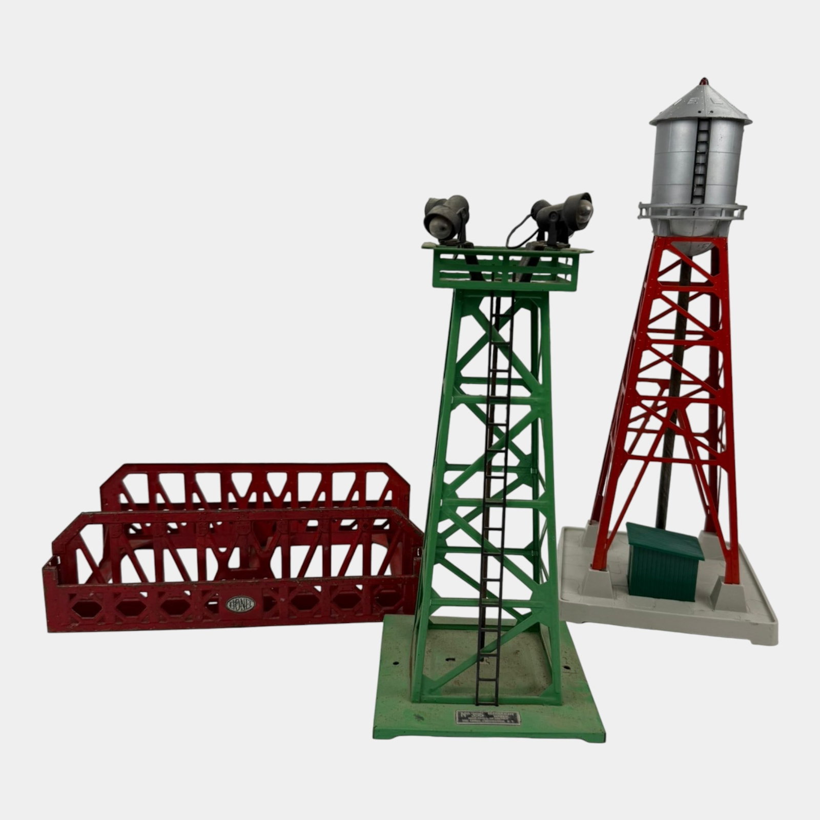 Lionel Trains Tin & Plastic 395 Floodlight Tower, 193 Industrial Water Tower, & 270 Metal Truss: Professional, fast, and affordable in house shipping available for all items. For higher resolution images please visit bid.craftedauctions.com Lionel Trains Tin & Plastic 395 Floodlight Tower, 193 In