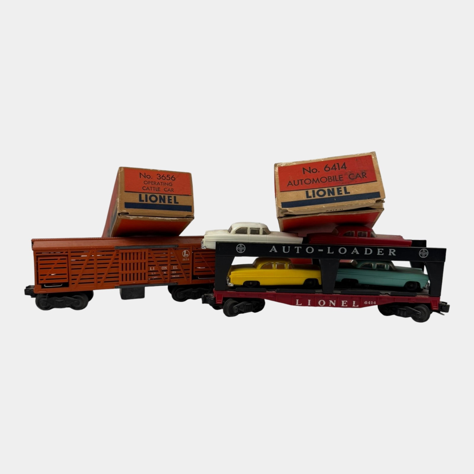 Lionel Trains Post War Auto Loader Train Car With 4 Multi Color Cars & 3656 Lionel Boxcar Train Cars (1 of 4)