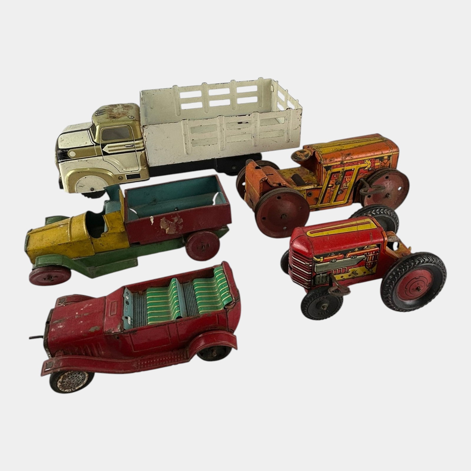 Louis Marx & Co. & Other Vintage Tin Litho Trucks Race Cars Tractor Wind Up Toys: Professional, fast, and affordable in house shipping available for all items. For higher resolution images please visit bid.craftedauctions.com Louis Marx & Co. & Other Vintage Tin Litho Trucks Race C