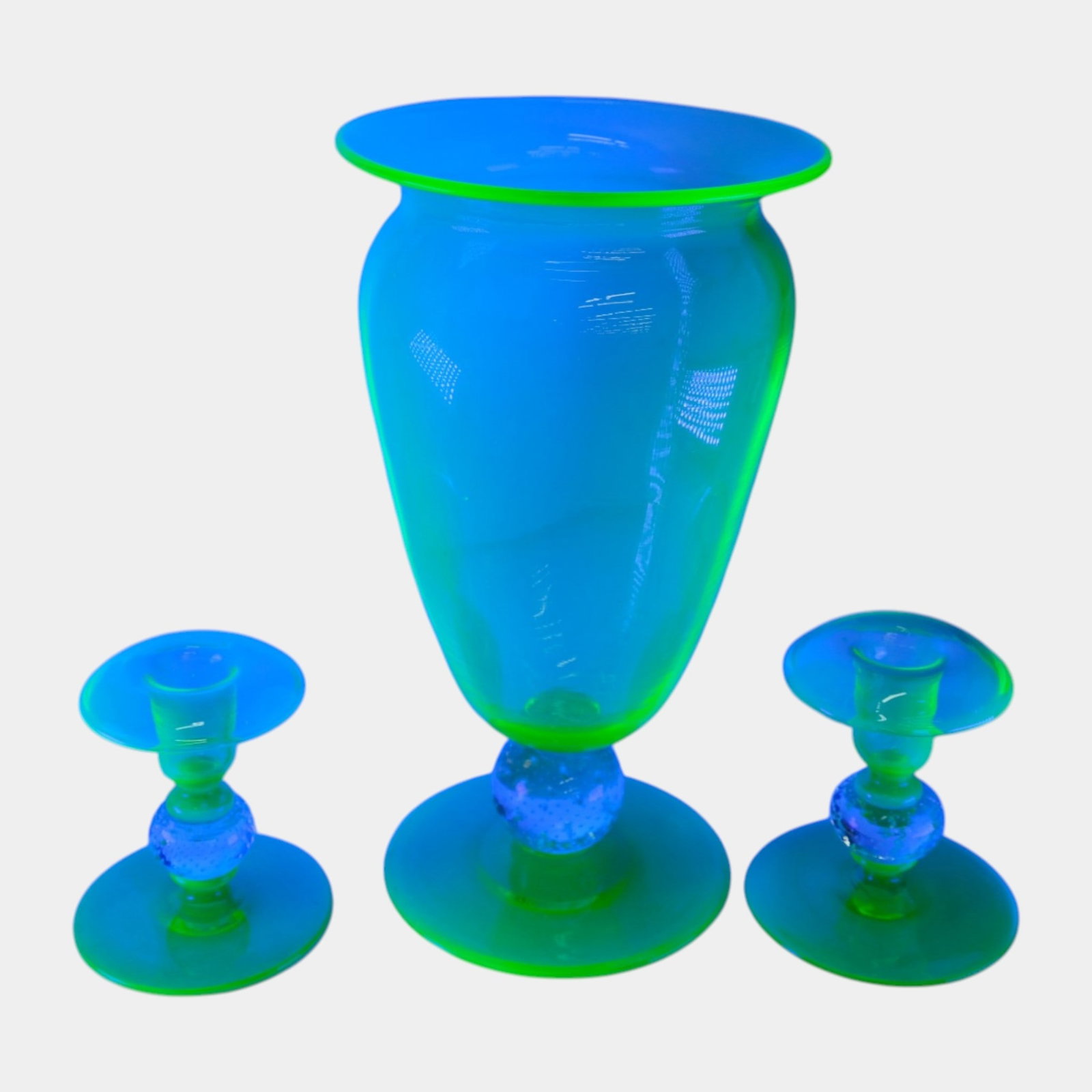 Pairpoint Mid Century Green Uranium Glass Controlled Bubble Ball Stem Vase & Candle Holders: Professional, fast, and affordable in house shipping available for all items. For higher resolution images please visit bid.craftedauctions.com Paripoint Mid Century Green Uranium Glass Controlled Bub