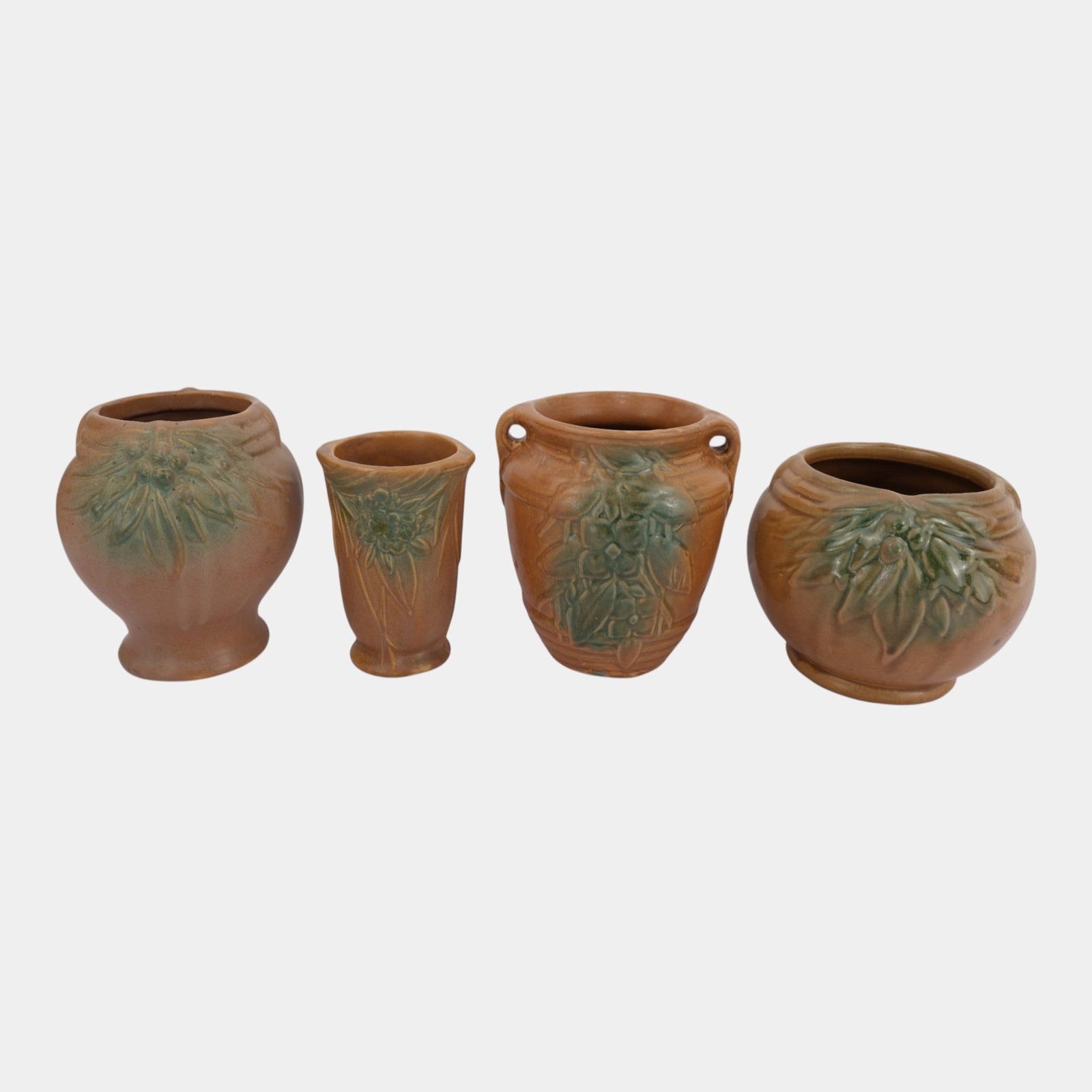 McCoy Pottery Matte Brown and Green Leaves And Berries Various Form Vases: Professional, fast, and affordable in house shipping available for all items. For higher resolution images please visit bid.craftedauctions.com McCoy Pottery Matte Brown and Green Leaves And Berries V