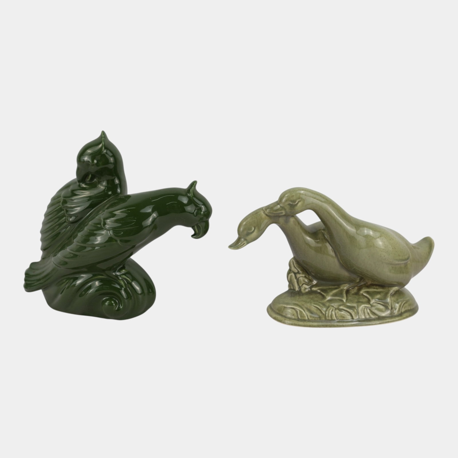 Red Wing Pottery Mid Century Green Geese And Parrot Ceramic Bird Figurines: Professional, fast, and affordable in house shipping available for all items. For higher resolution images please visit bid.craftedauctions.com Red Wing Pottery Mid Century Green Geese And Parrot Cera