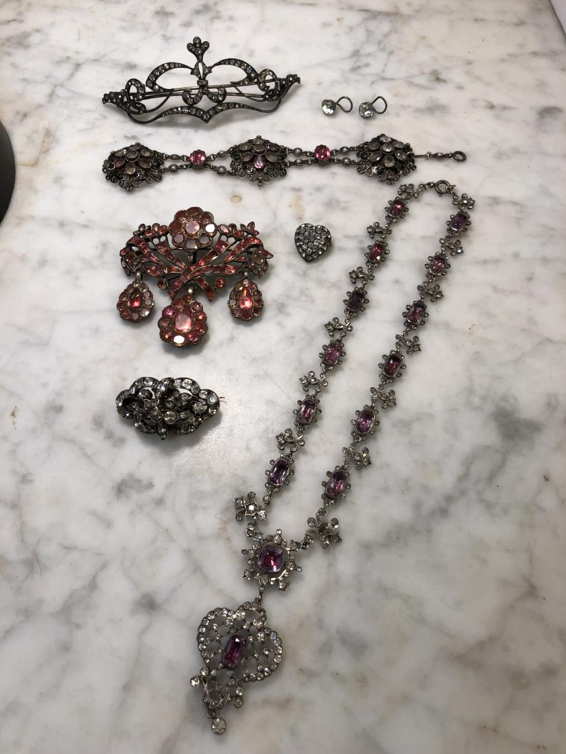 Estate Jewelry Lot: Victorian Tiara Style Hairpiece with white paste stones, pave set, unique antique earrings with curved ear post with large cut glass diamond look. Victorian multi colored necklace with paste stones, p