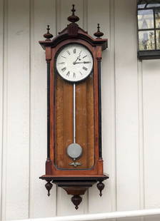 E. Howard and Co. #59 Vienna Regulator Clock: E. Howard and Co. #59 Vienna Regulator Clock all in walnut carved case with original finish, measures approx. 46" to bottom, 8" dial, glass sides, all finials, pendulum and weights are there.