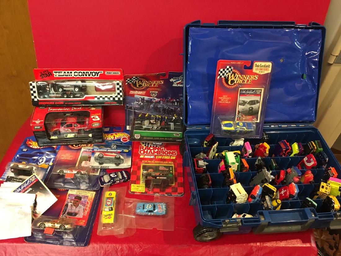 Hot Wheels and Racing Cars: Hot Wheels and racing cars collection. Some are new/never opened, and Hot Wheels cars in wheeled case.