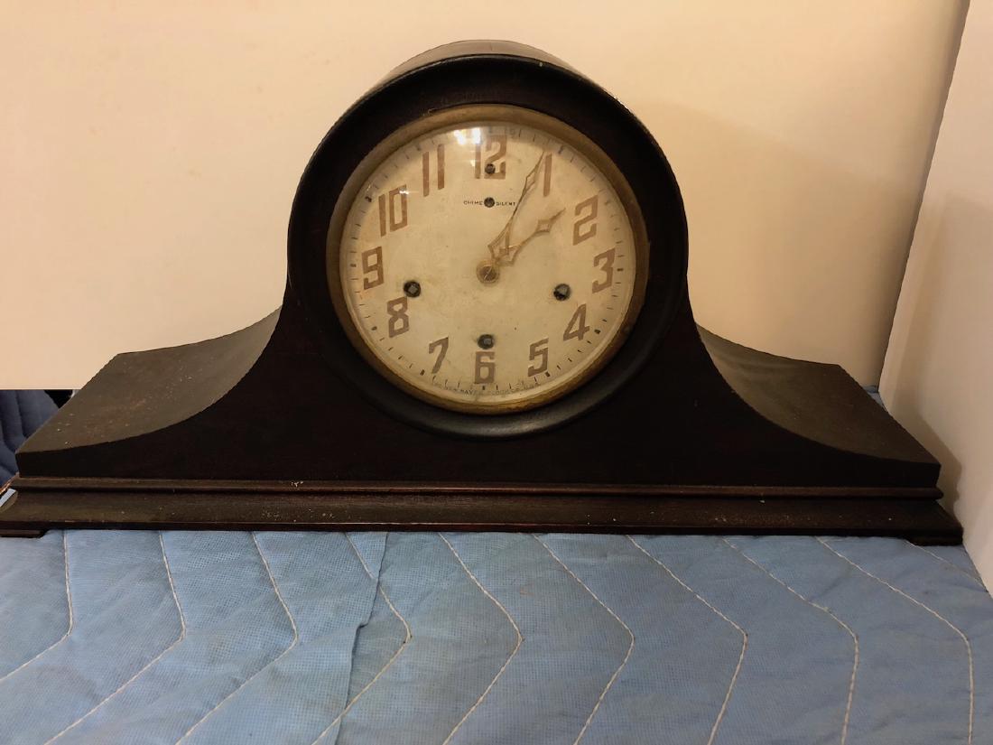 Mahogany New Haven Mantel Clock: New Haven triple wind chiming mantel clock with mahogany case.