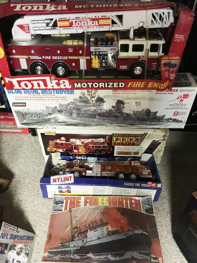 Scale Models: Large scale models including Tonka firetruck, Blue Devil Destroyer, Rescue Boom Fire Engine with Remote control, The Firefighter Boat and Nylant fire truck.