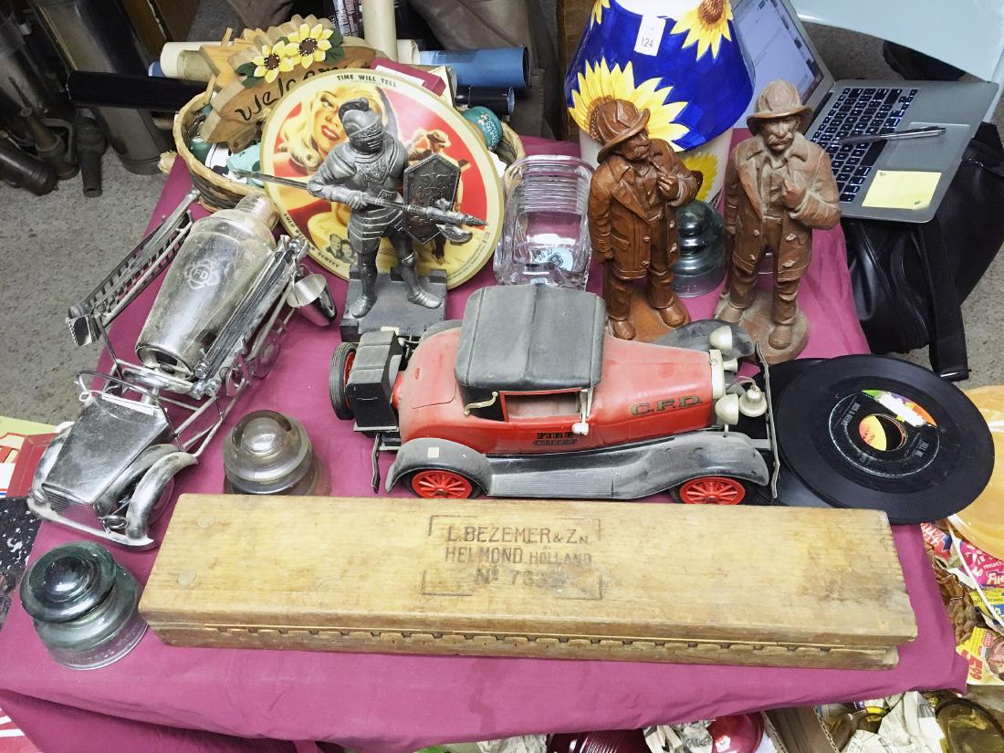 Estate Collectibles: Estate collectibles include vintage car decantor, tobacco mold, wooden miniatures, Fire truck bar set, glass insulators, fireman figurines, knight figurine, vintage 45s and collectible record, etc.