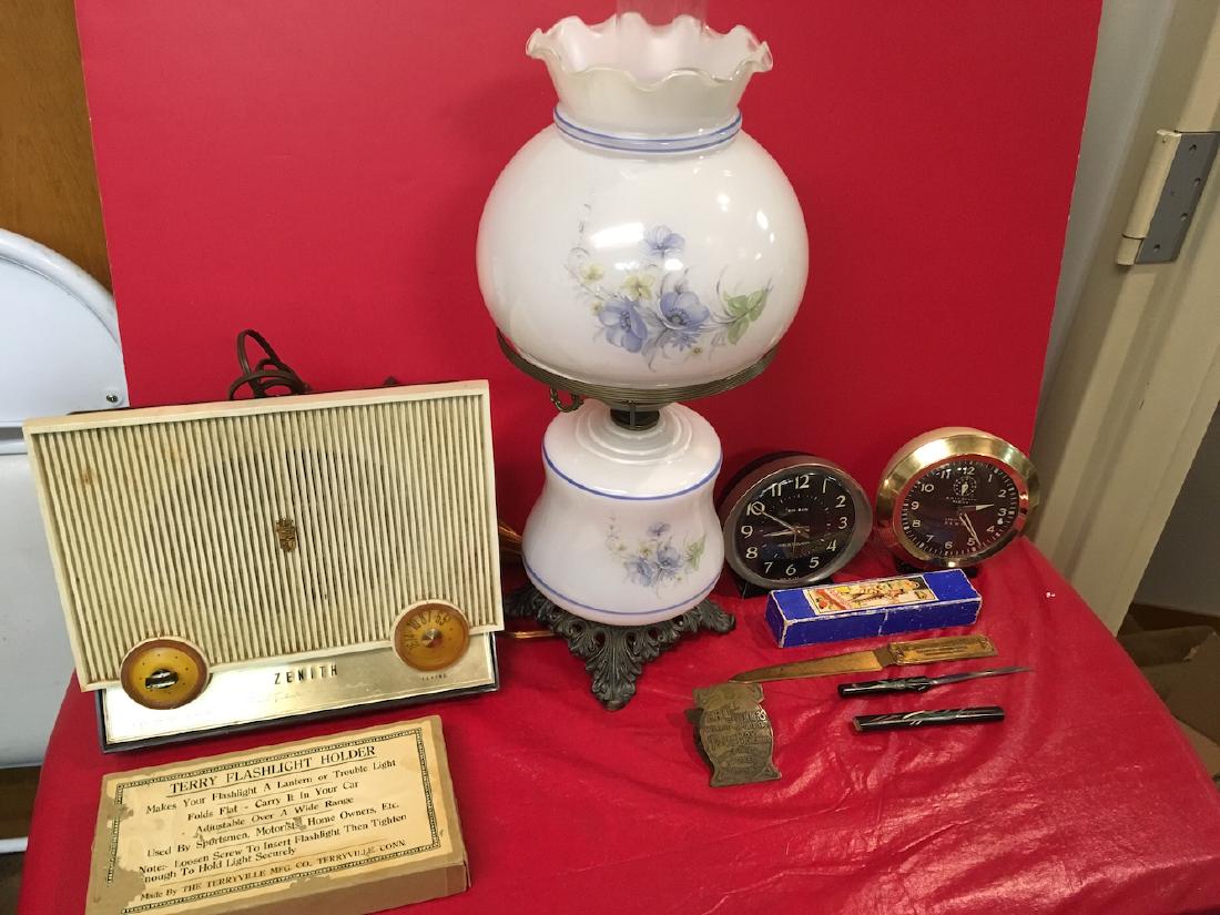 Estate lot: Includes valencia harmonica, terry flashlight holder, asian motif knife, Big Ben clocks and Quizzell lamp.