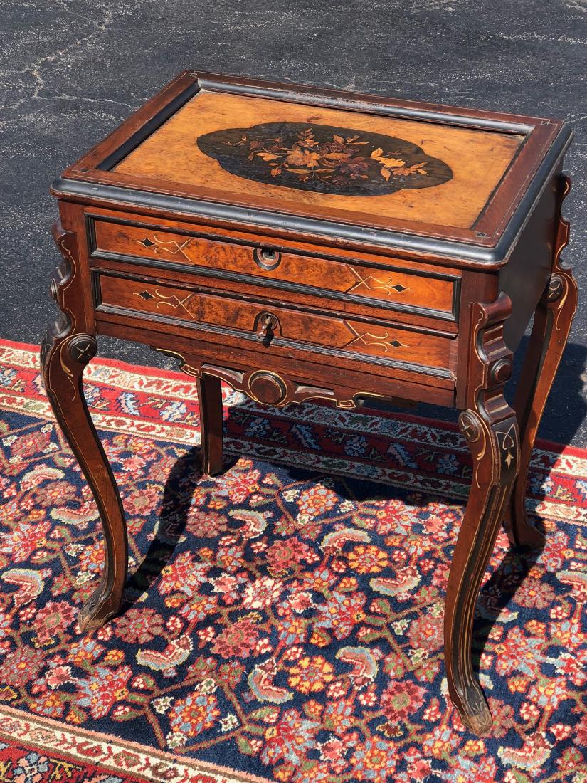 Renaissance Revival Marquetry Inlaid Sewing Stand: Renaissance Revival Marquetry Inlaid Sewing Stand. Beautiful marquetry inlaid on top, all original, Tiger Maple interior, mirror inside with key. Would also make a great jewelry or make up stand.