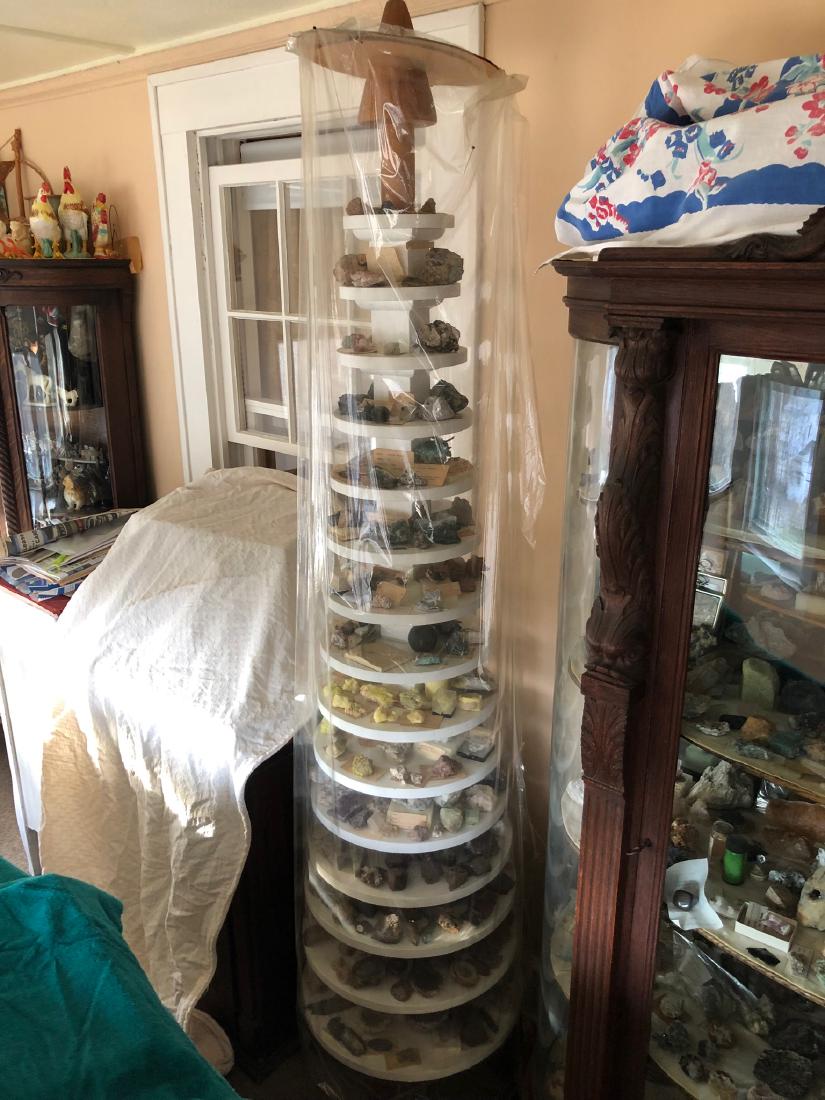 Mineral Collection: Mineral collection on 15 shelf display (display to be auctioned seperately). Large mineral collection including native copper, barite, florite, sulfur, geodes, turquios, garnets, etc. All from a lifet