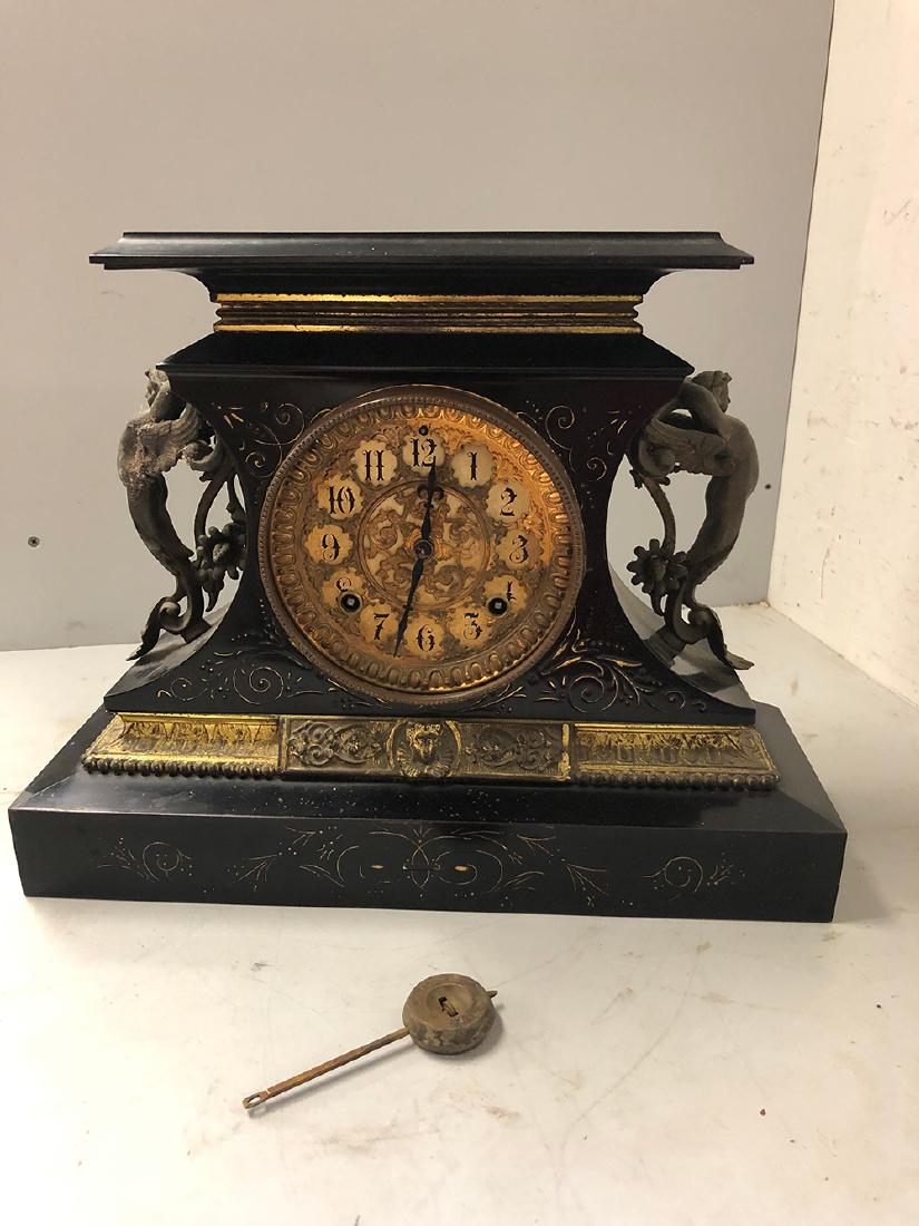 Ansonia Mantel Clock: Ornate mantel clock, Ansonia Clock Co., very ornate, incising all over, full winged mermaid/serpents on each side, all original. Was in running condition at the estate. From the Chatham, Ma, Cape Cod 