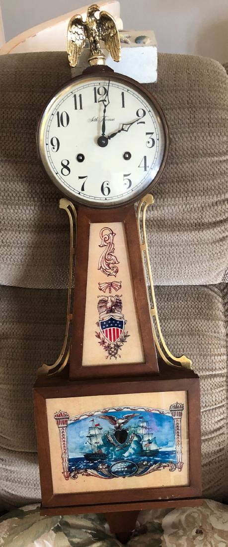 Seth Thomas Banjo Clock: Set Thomas, Thomaston, CT nautical themed banjo clock with sailing ships on glass door, nice throat glass. Was in running condition at the estate. From the Chatham, Ma, Cape Cod Collection.
