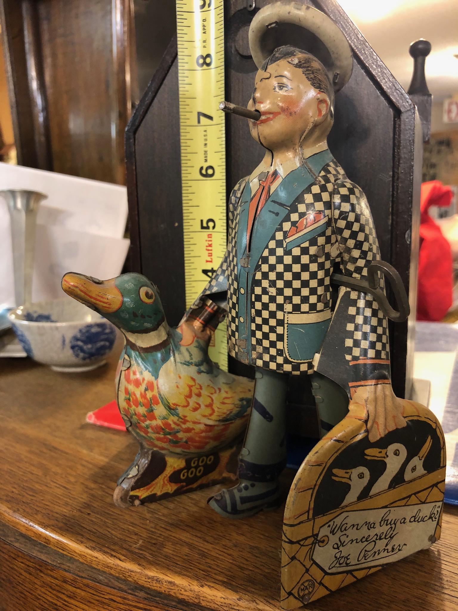 Vintage Joe Penner Wind Up Tin Toy: Vintage tin toy, wind up Joe Penner "Want to buy a duck?" with Goo Goo, c. 1930s.