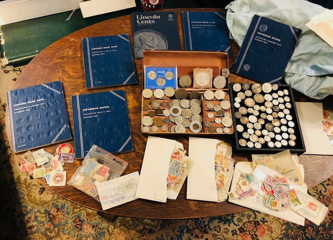 Estate Coins and Stamp Collection: Estate Coin and Stamp Collection includes 1986 1 oz. Americna Eagle, silver dollar, halfs, quarters, dimes, Indian head penny, Buffalo nickel, Kennedy clad silver halves, nickels, stamps. All being so