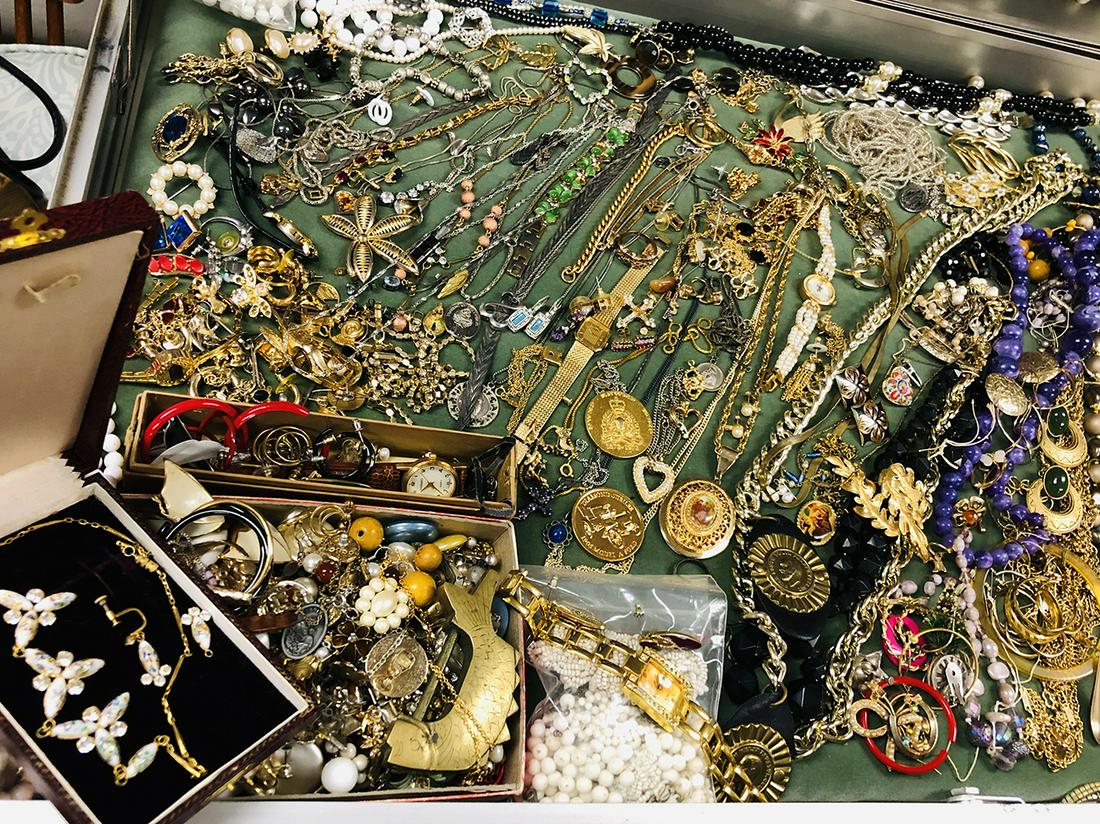 Estate Jewelry Treasure Trove: Treasure Trove of Estate Jewelry including sterling silver locket in shape of fish, beads, necklaces, pins, watches, rings, etc. All being sold as one lot as found at the estate!